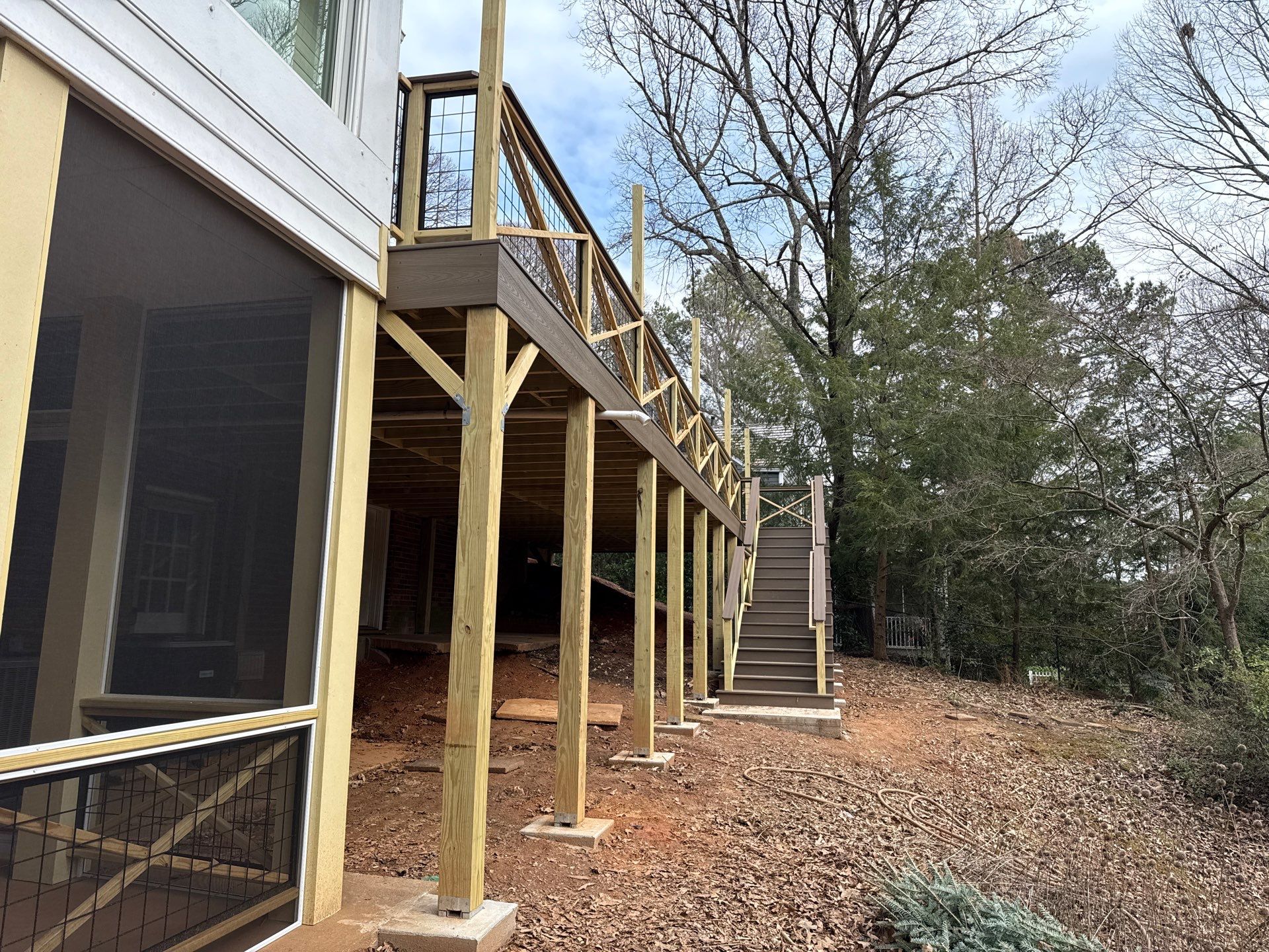 Deck Build and Screened-In Porch Install with Wild Hog 6' Black Mesh Panel Railing by Nelson Exteriors
