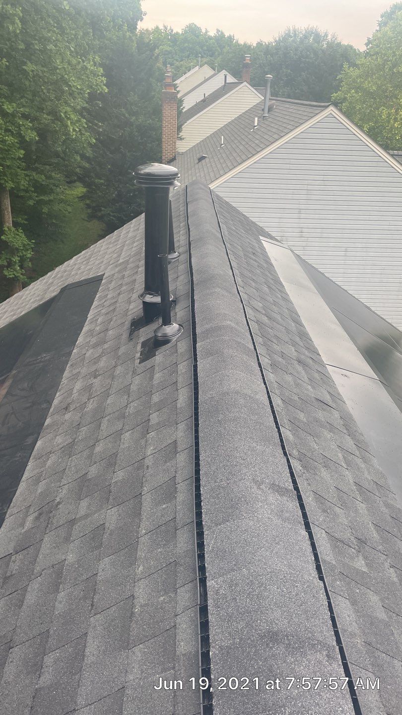 Exterior Home Makeover using GAF Timberline HDZ, GAF Decotech, and James Hardie Siding by American Home Contractors