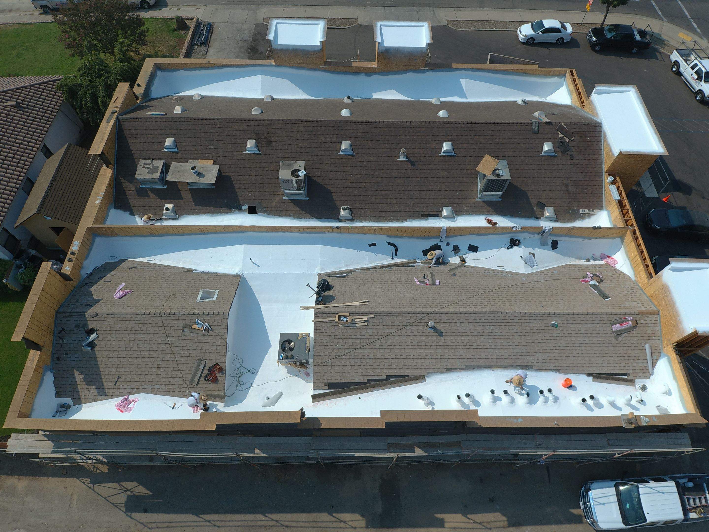 Spray foam and coatings using Conklin Benchmark/PUMA XL coatings and spray foam by Straight Edge Roofing Inc