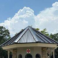 24ga 1.5" Snap-Lock Dark Bronze by Total Roofing System The Metal Roof Experts