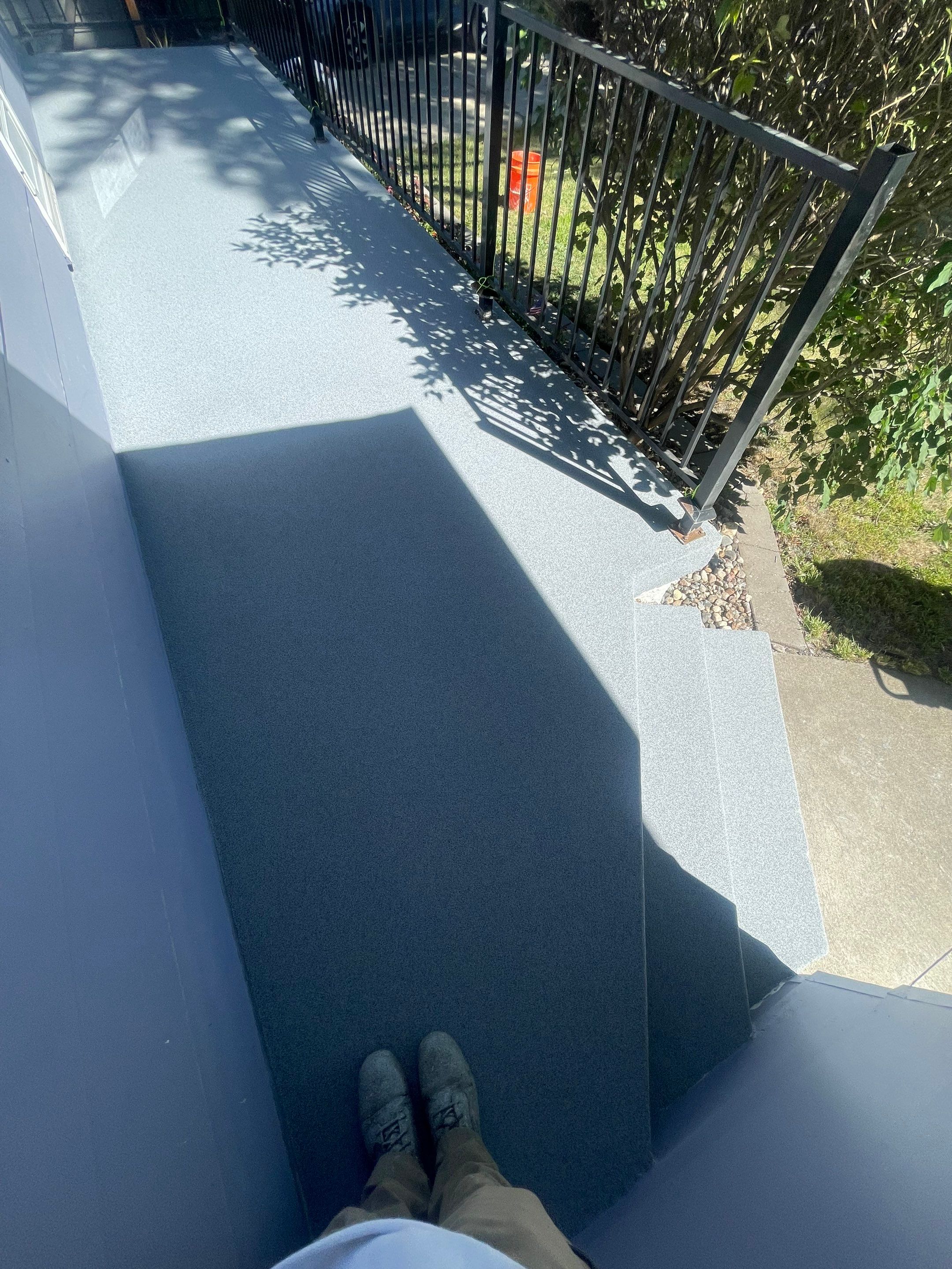Sioux Falls Concrete Porch Coating with Starry Evening Finish by Select Painting, Coatings & Garage Cabinets