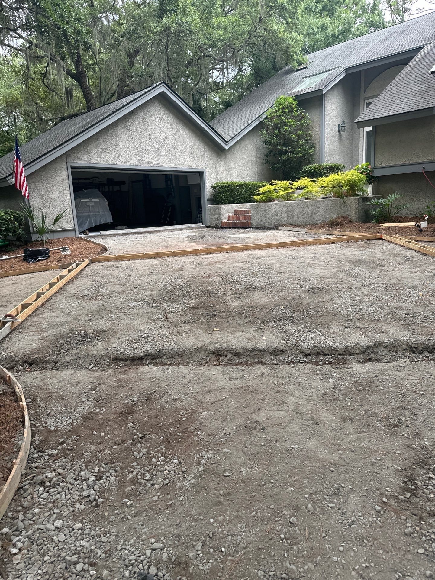 Hilton Head Island Concrete Driveway Replacement with Decorative Paver Borders by Lowcountry Scapes, LLC
