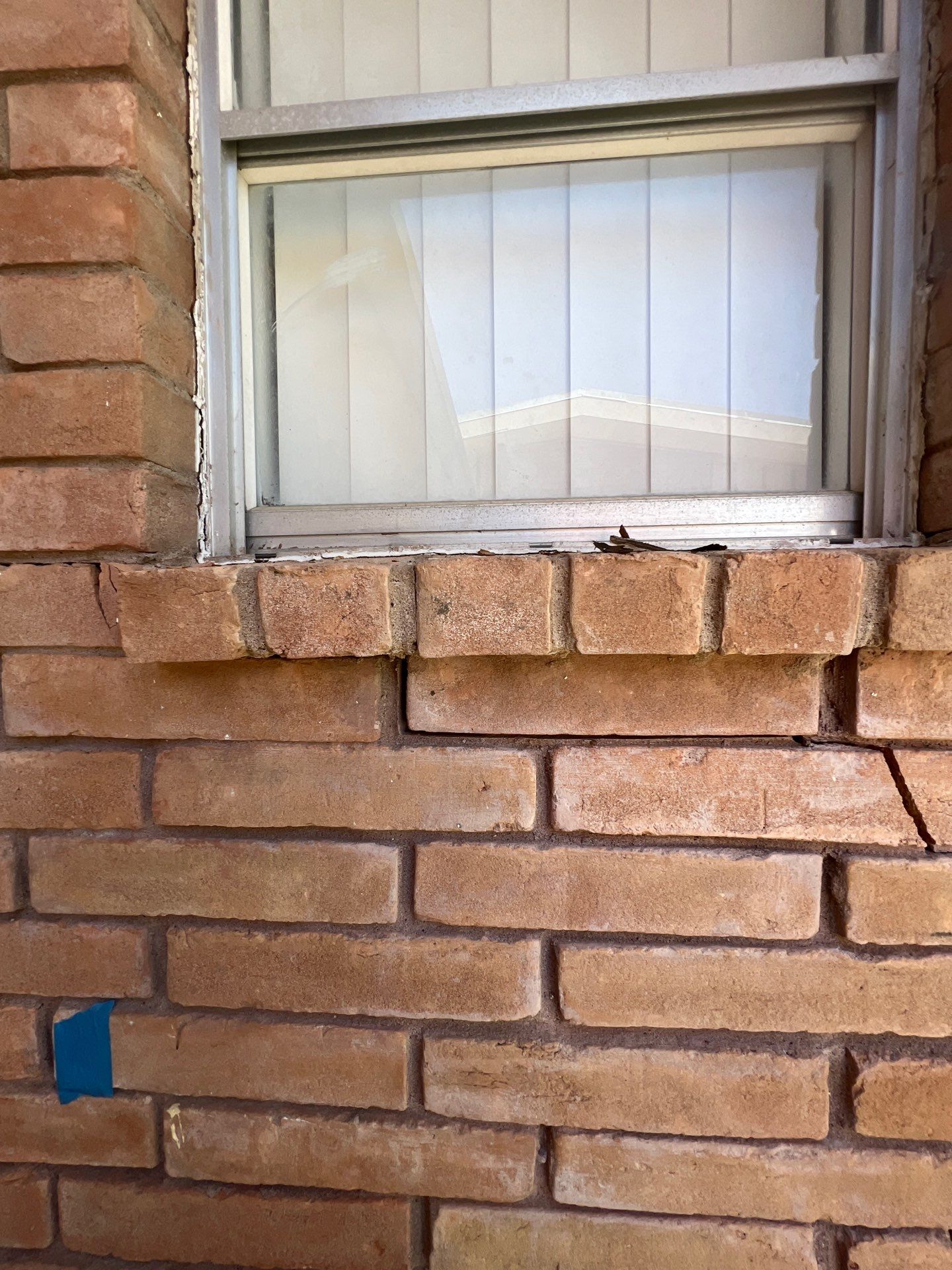 Windows in Brick with a Bay Window by Bayfront Roofing and Construction