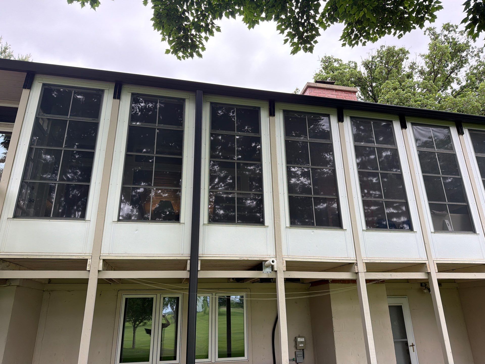 Exterior Trim Painting and Rafter Staining in Sioux Falls by Select Painting, Coatings & Garage Cabinets