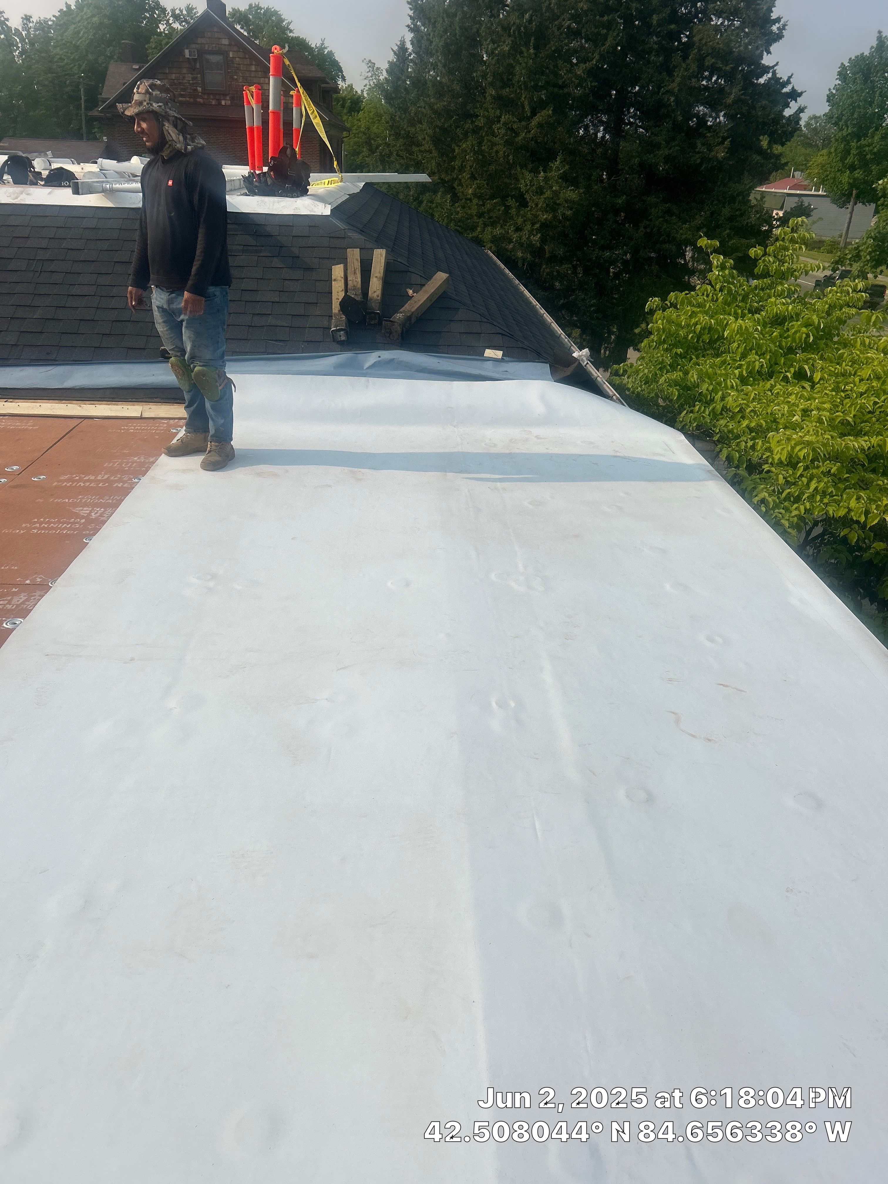 Commercial Flat and Shingled Roof Project by 42 North Construction, LLC.