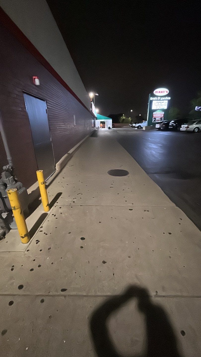 Concrete sidewalk cleaning and degreasing by Northern Power Washing LLC.
