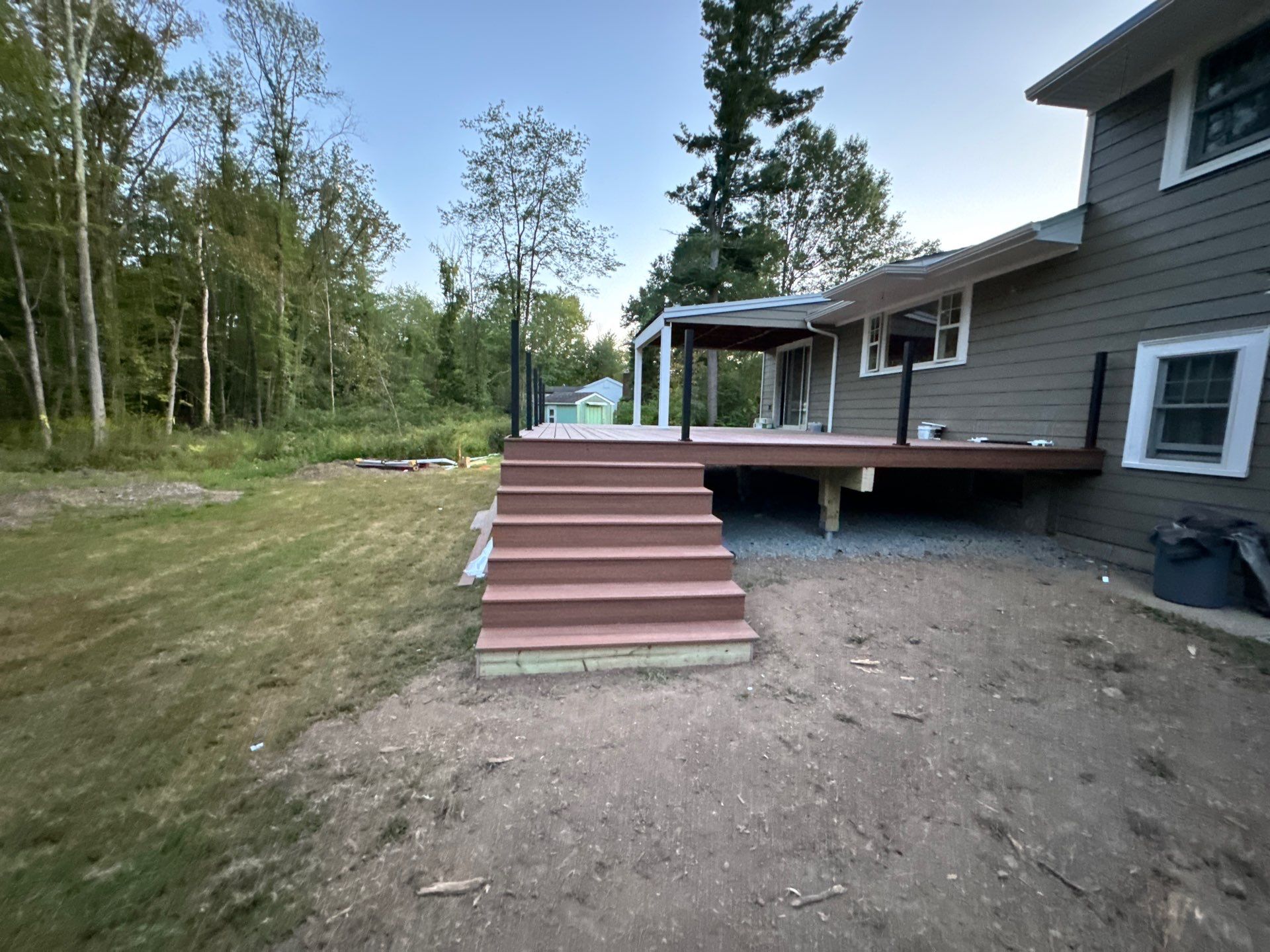 New Deck using Trex Tiki Torch  by deck guardian