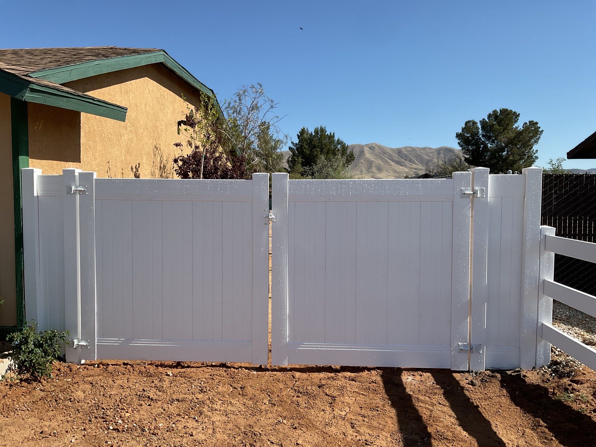 Fence Installation using Ranch Style Vinyl by Fence Guys Inc.
