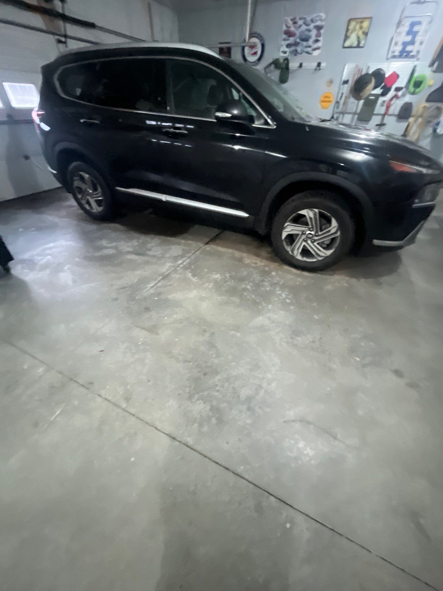 High-Gloss Epoxy Garage Floor Coating in Sioux Falls by Select Painting, Coatings & Garage Cabinets