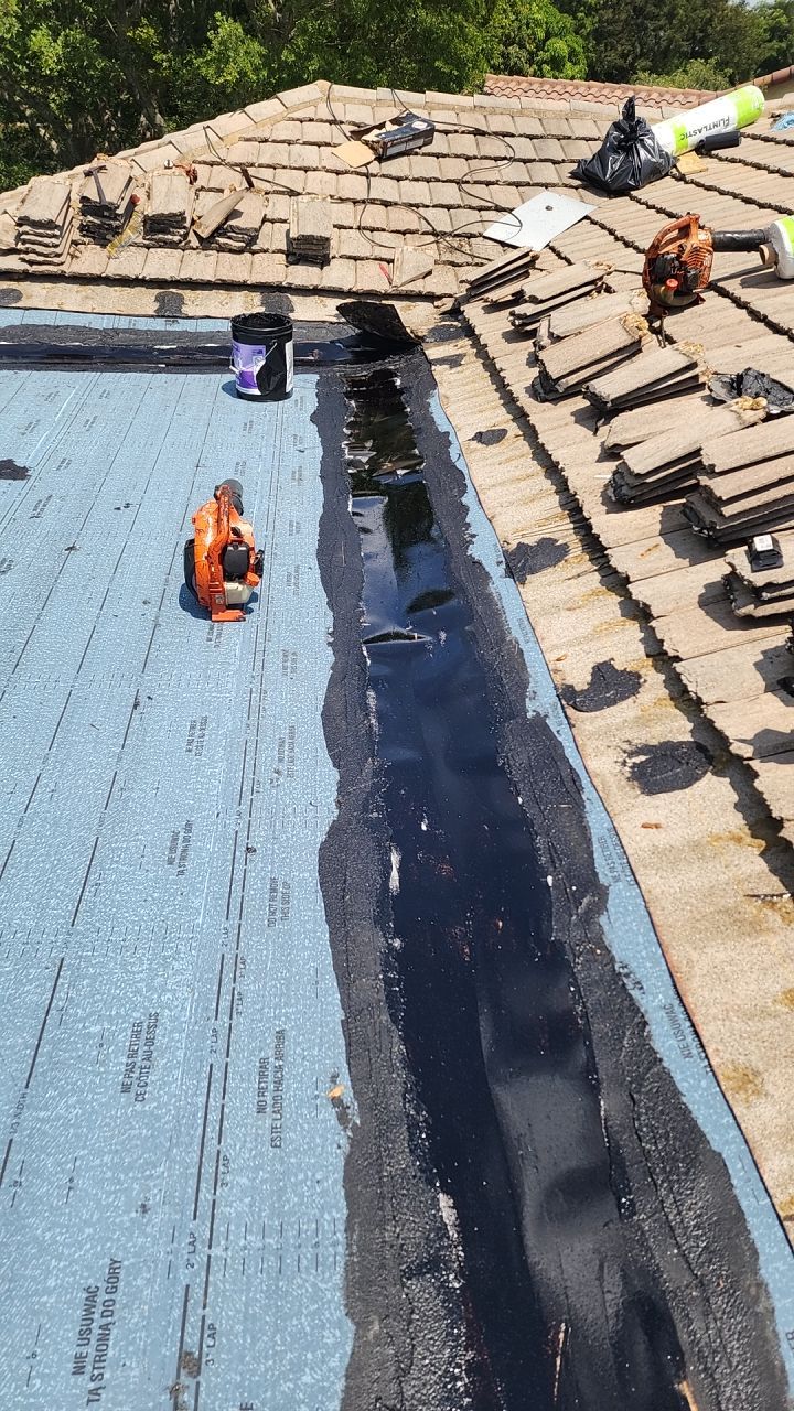 Concrete Tile Roof Restoration and Flat Roof Installation in Boca Raton by Aastro Roofing