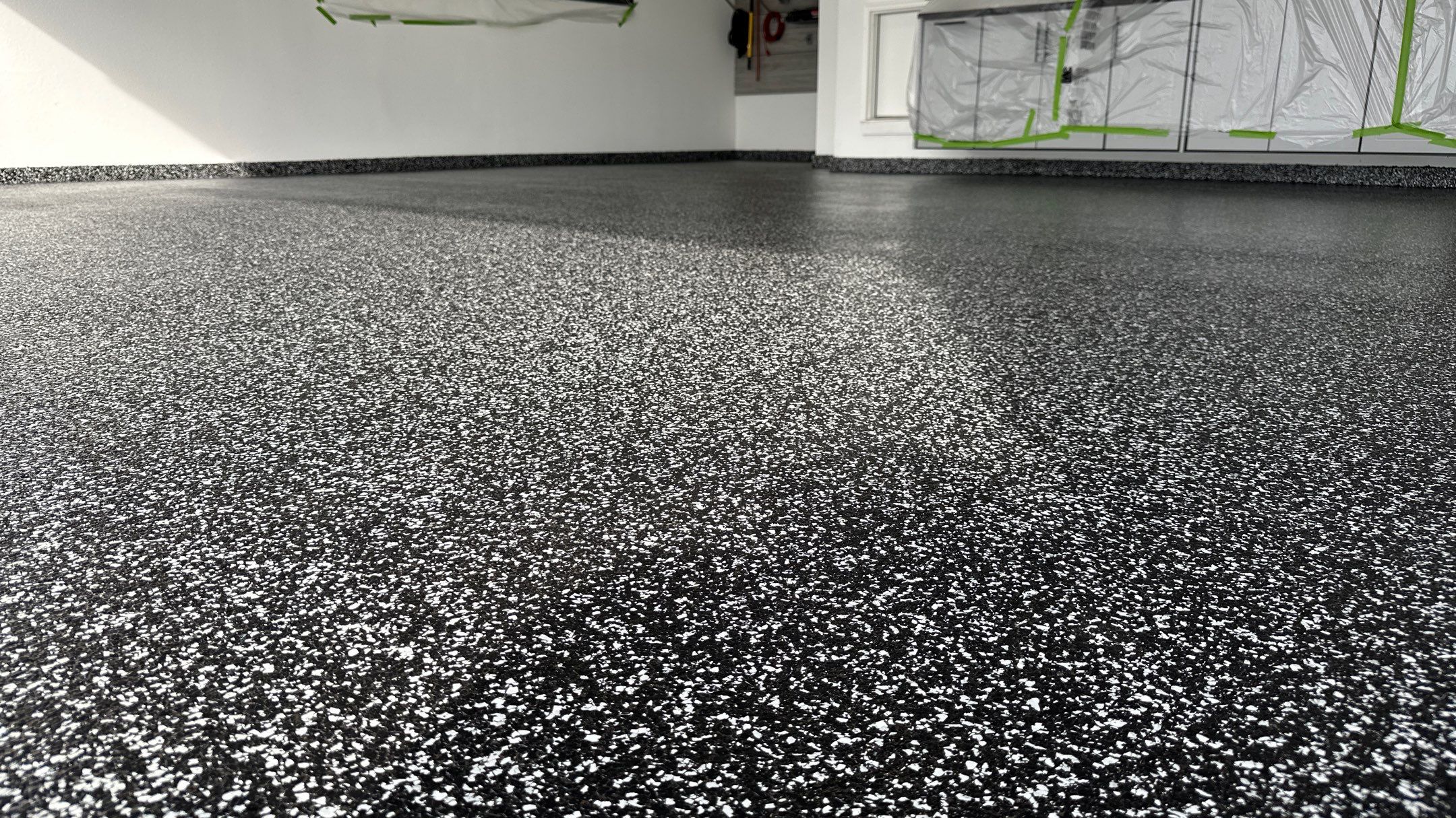 John H. received his dream garage with cabinets and a Banner Garage Floor by Banner Garage