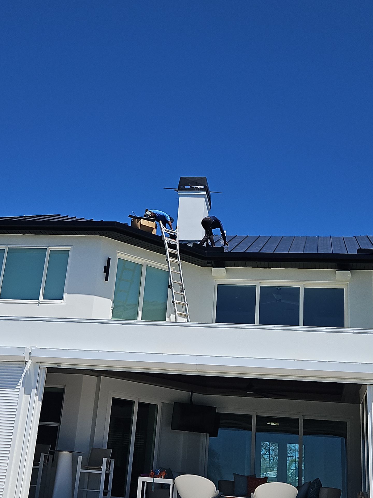 Soffit and Fascia Installation and black seamless gutters in Sarasota FL by Gutter Professors