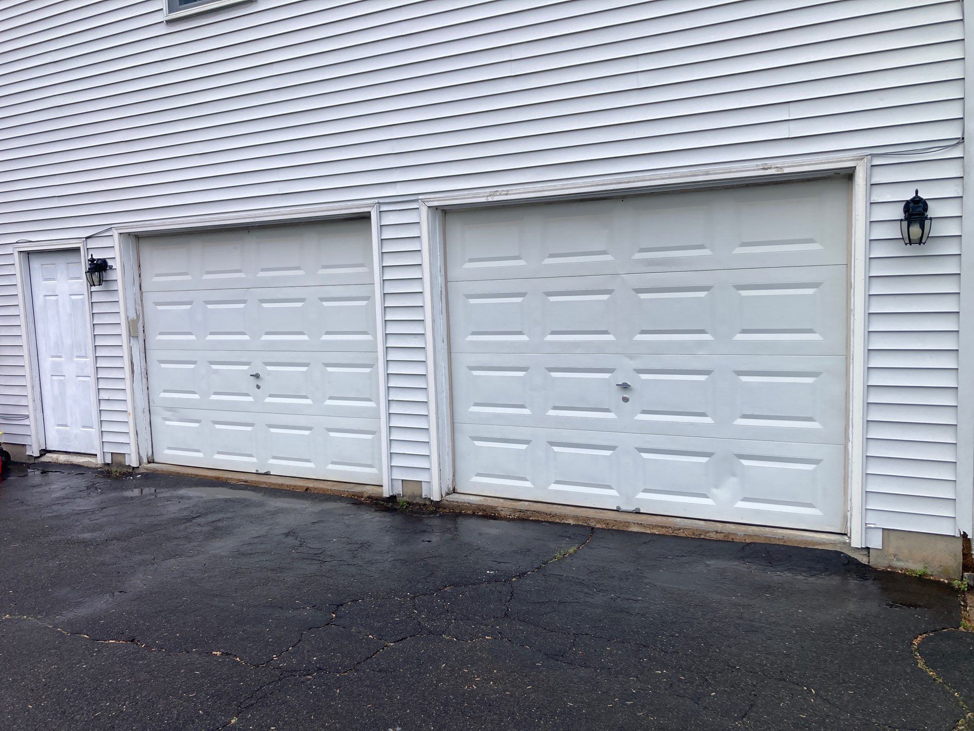 Double Garage Door Transformation by DiGiorgi Roofing and Siding Inc