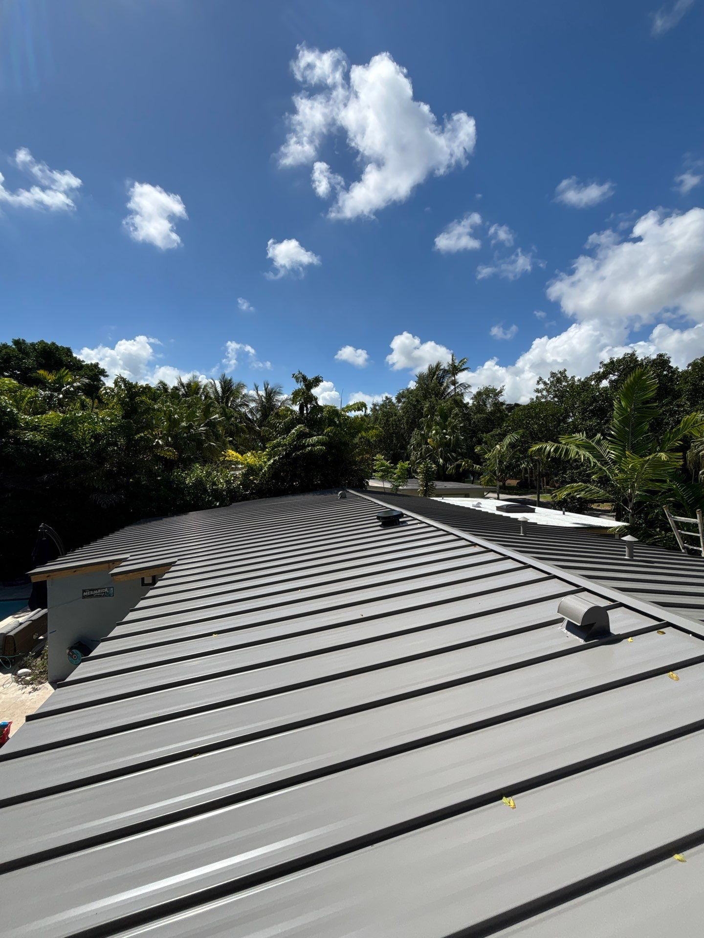 Metal Roof Replacement by Art's Roofing & Construction