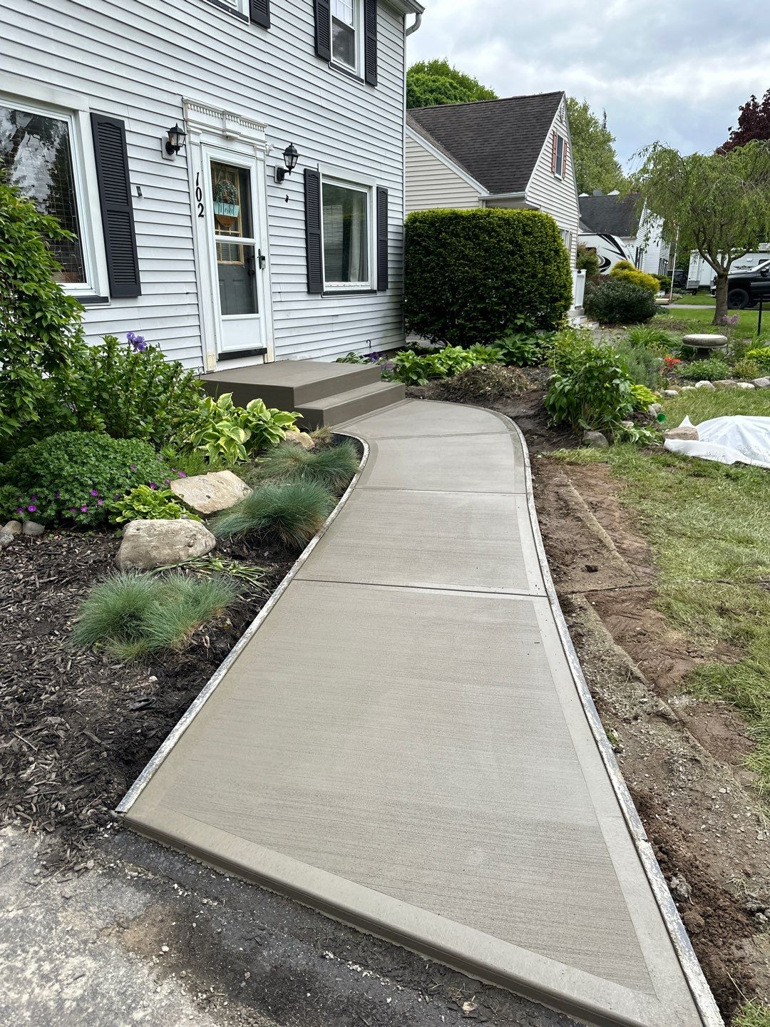 Broom Finish Walkway  by NG Masonry & Construction LLC