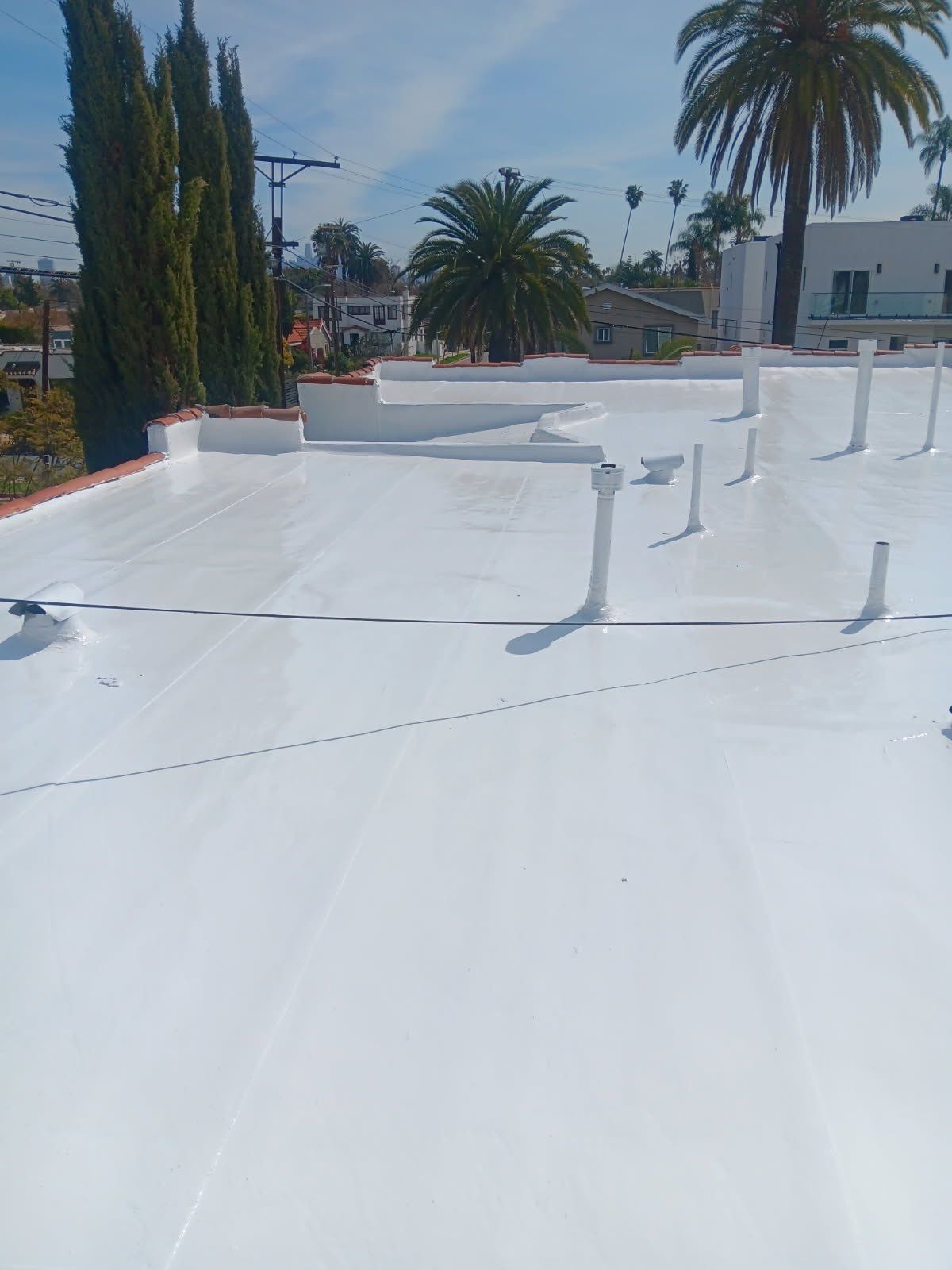 Silicone Membrane Installation using American Standard Coatings Silicone-S by Hull Brothers Roofing