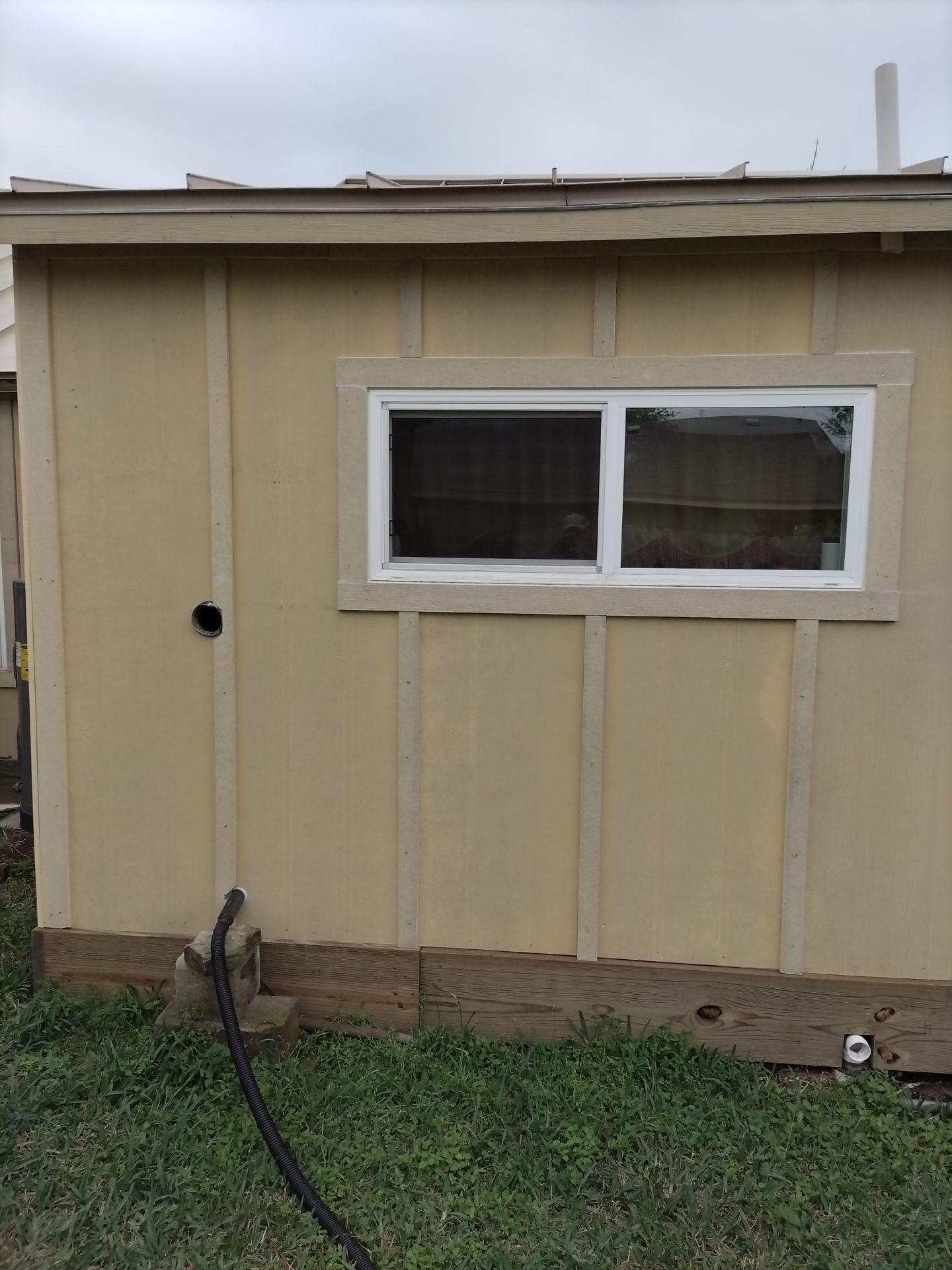 Vinyl to Hardie by Bayfront Roofing and Construction