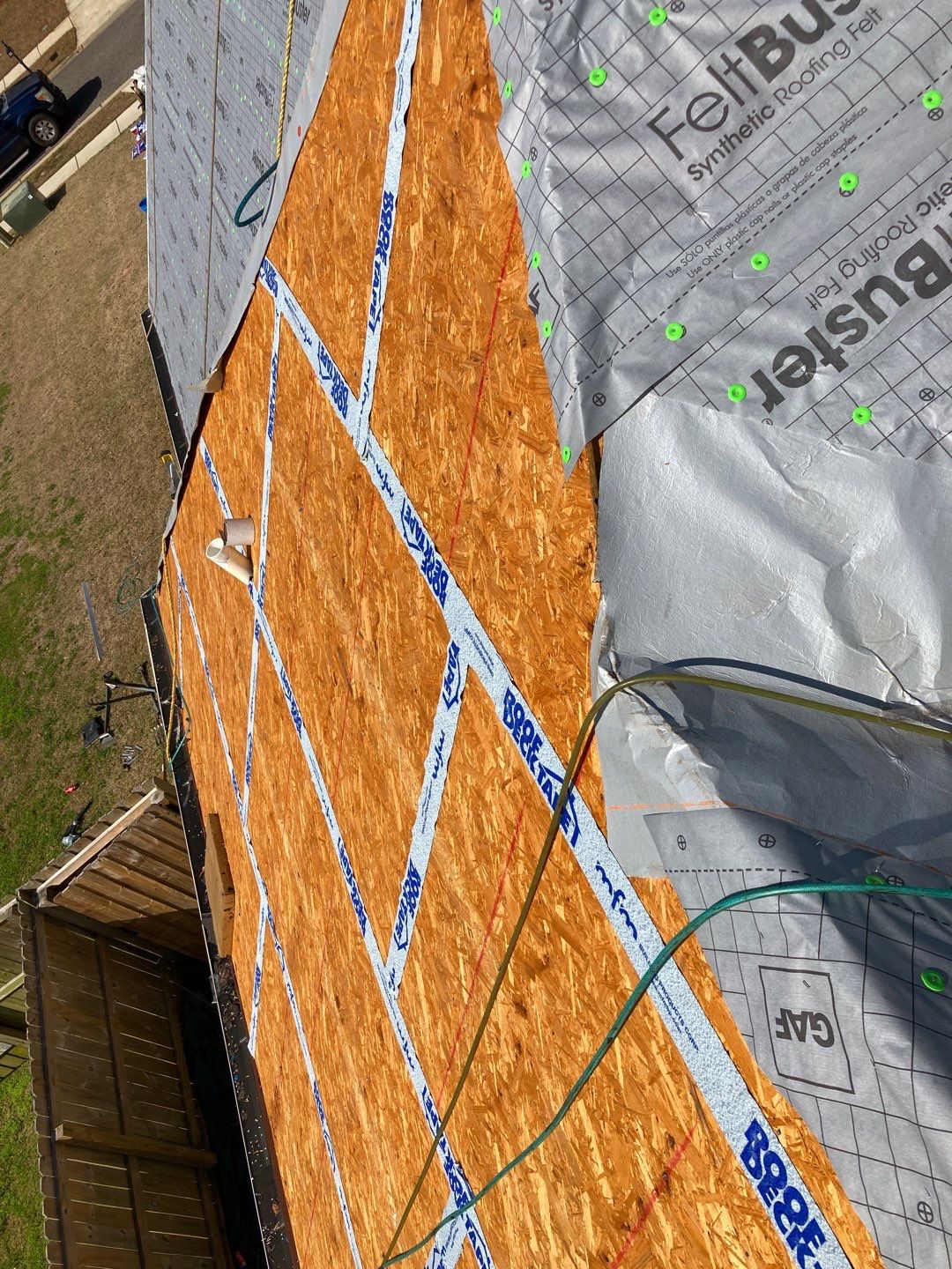Residential Roofing Installation using Roof Replacement by American Roofing & Construction LLC
