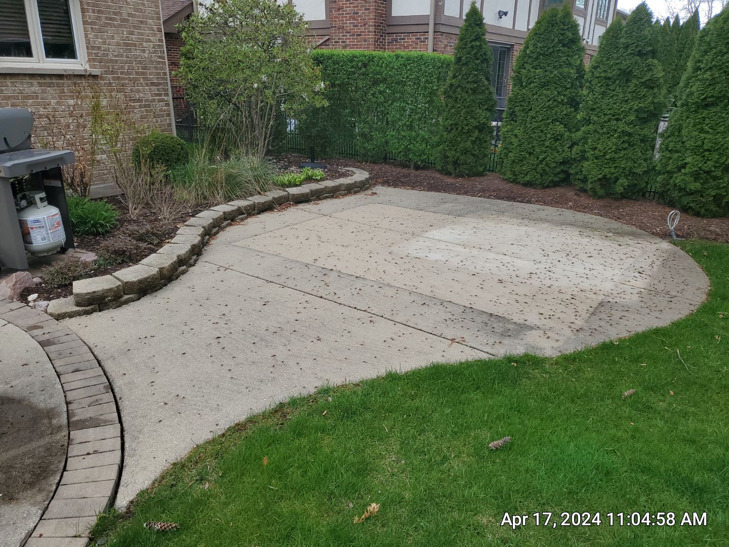 concrete patio and driveway cleaning by Northern Power Washing LLC.