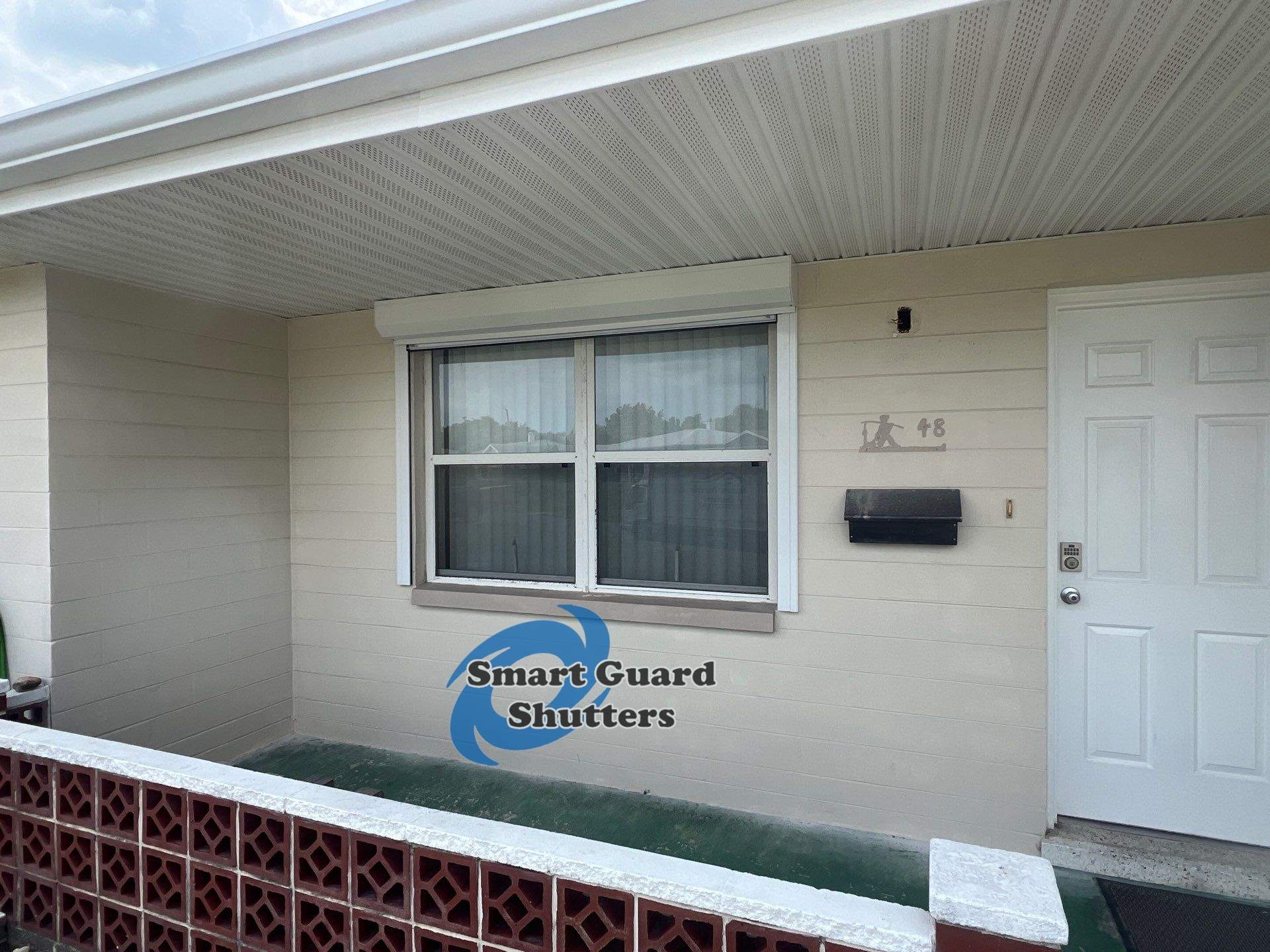 Rolling Shutters in White by Smart Guard Shutters