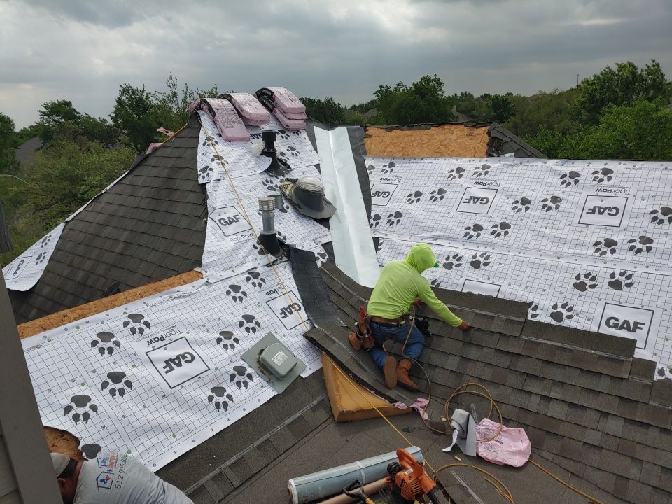 Residential Roof Replacement and Solar Panel Integration in Austin by Caliber Restoration LLC