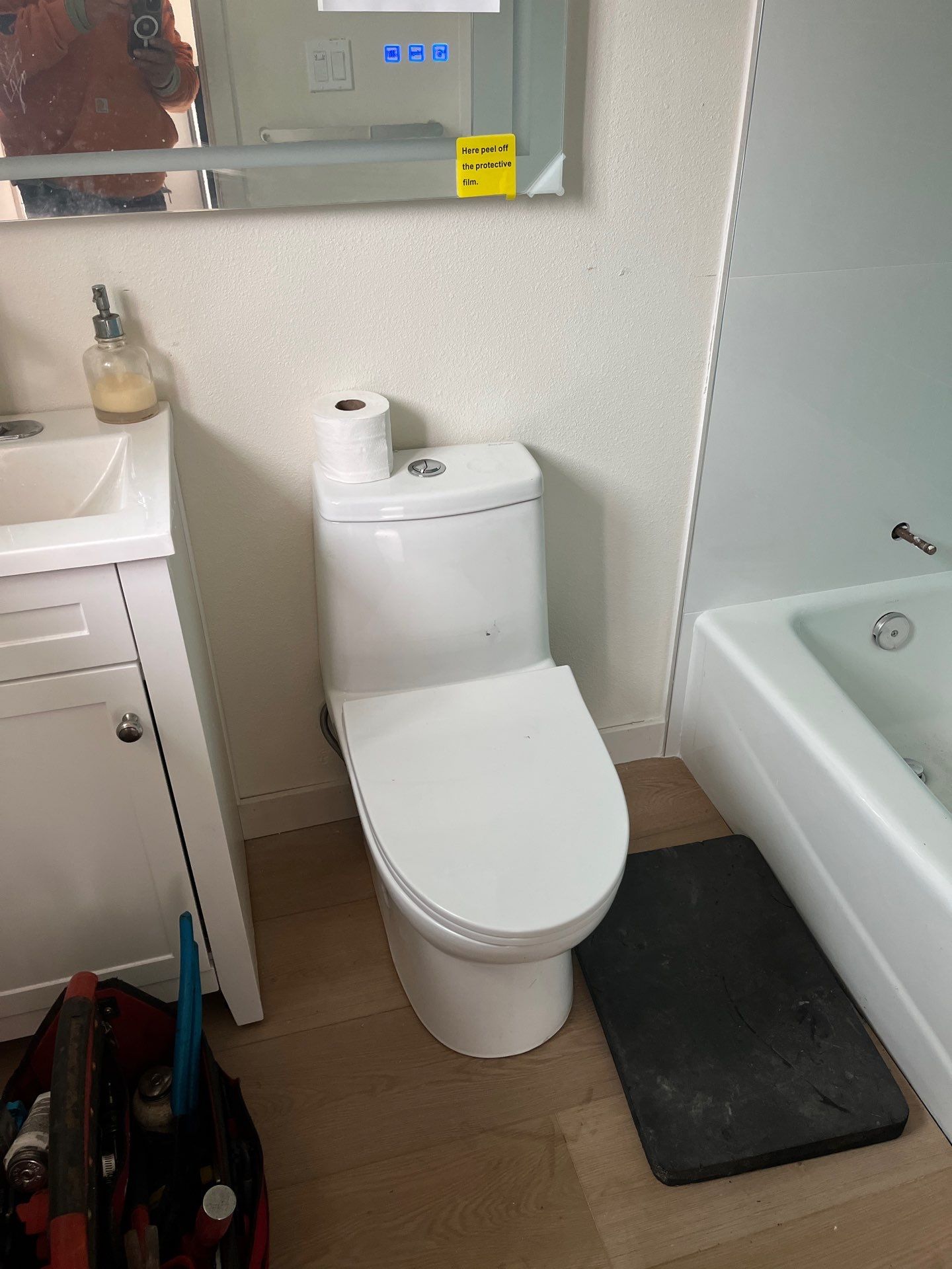 Scope of Work: Installation of Shower, Toilet, Sink, Fixtures, Pipes, and Seals by Us Plumbing