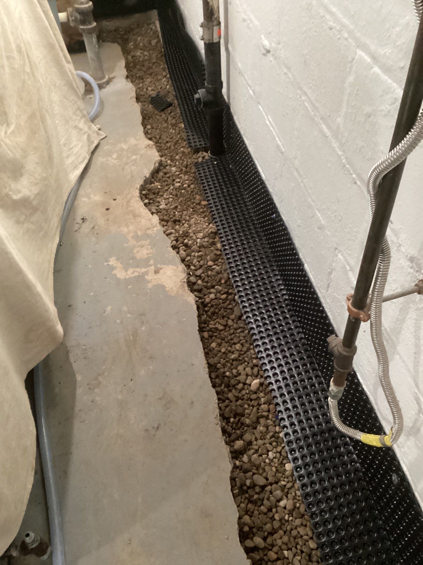 Basement Waterproofing for Kristi & Danny in St. Paul by Waterproofing Northeast
