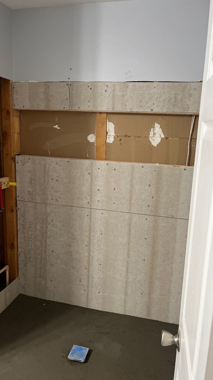 Tub to walk-in shower conversion, and tile flooring by Prudencio