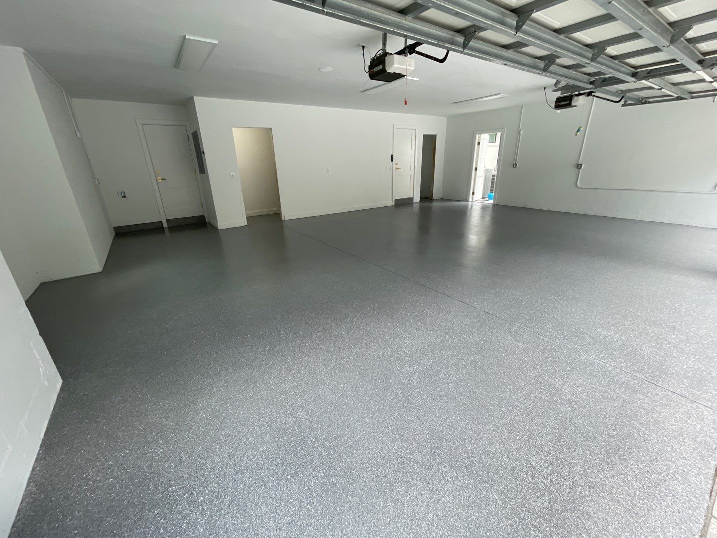 Garage Project in Gainesville, FL in Hybrid Turquoise  by Cross Creek Concrete Coatings