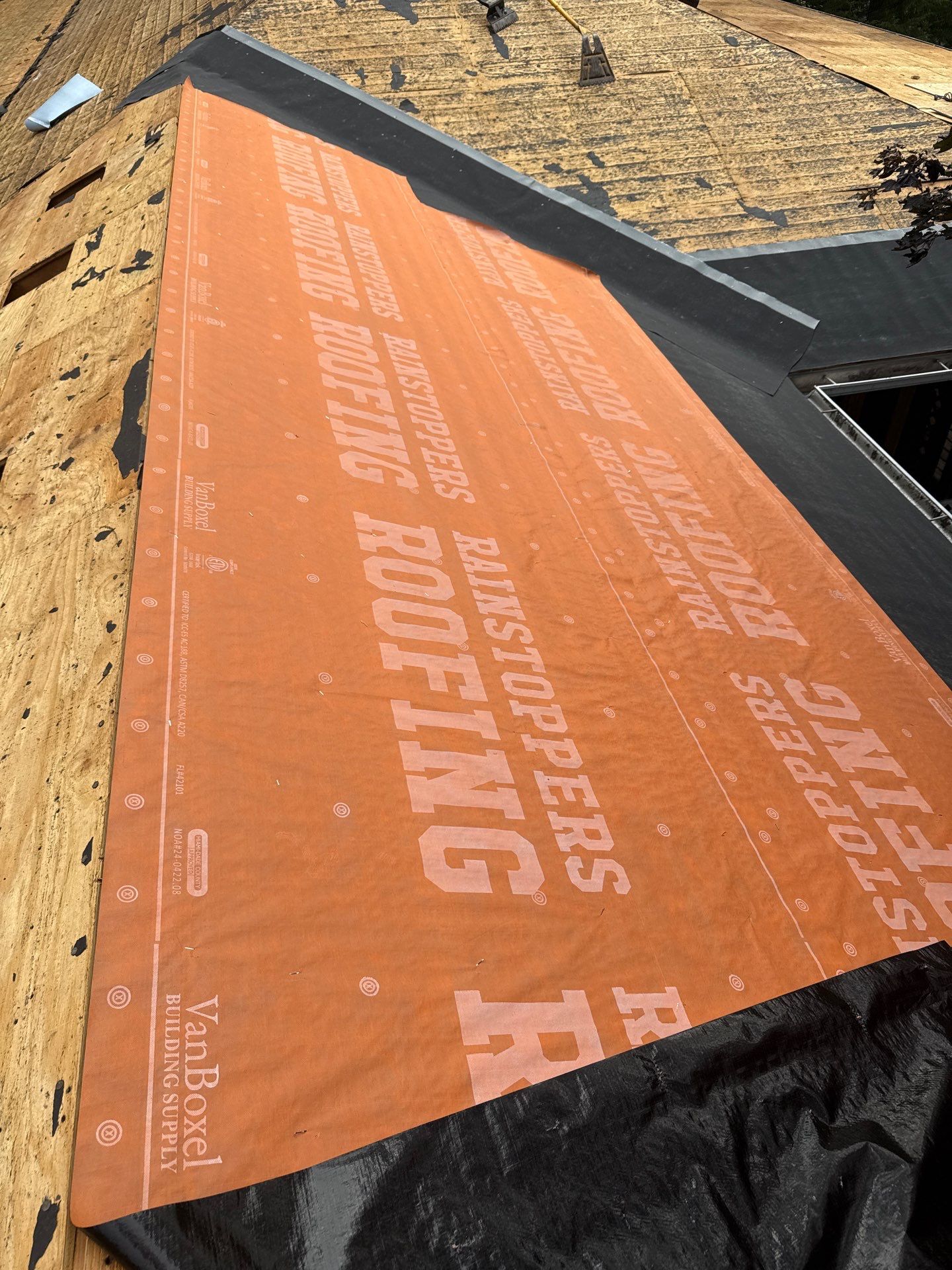 Residential Roofing Installation using GAF Timberline HDZ Charcoal by Rainstoppers Roofing