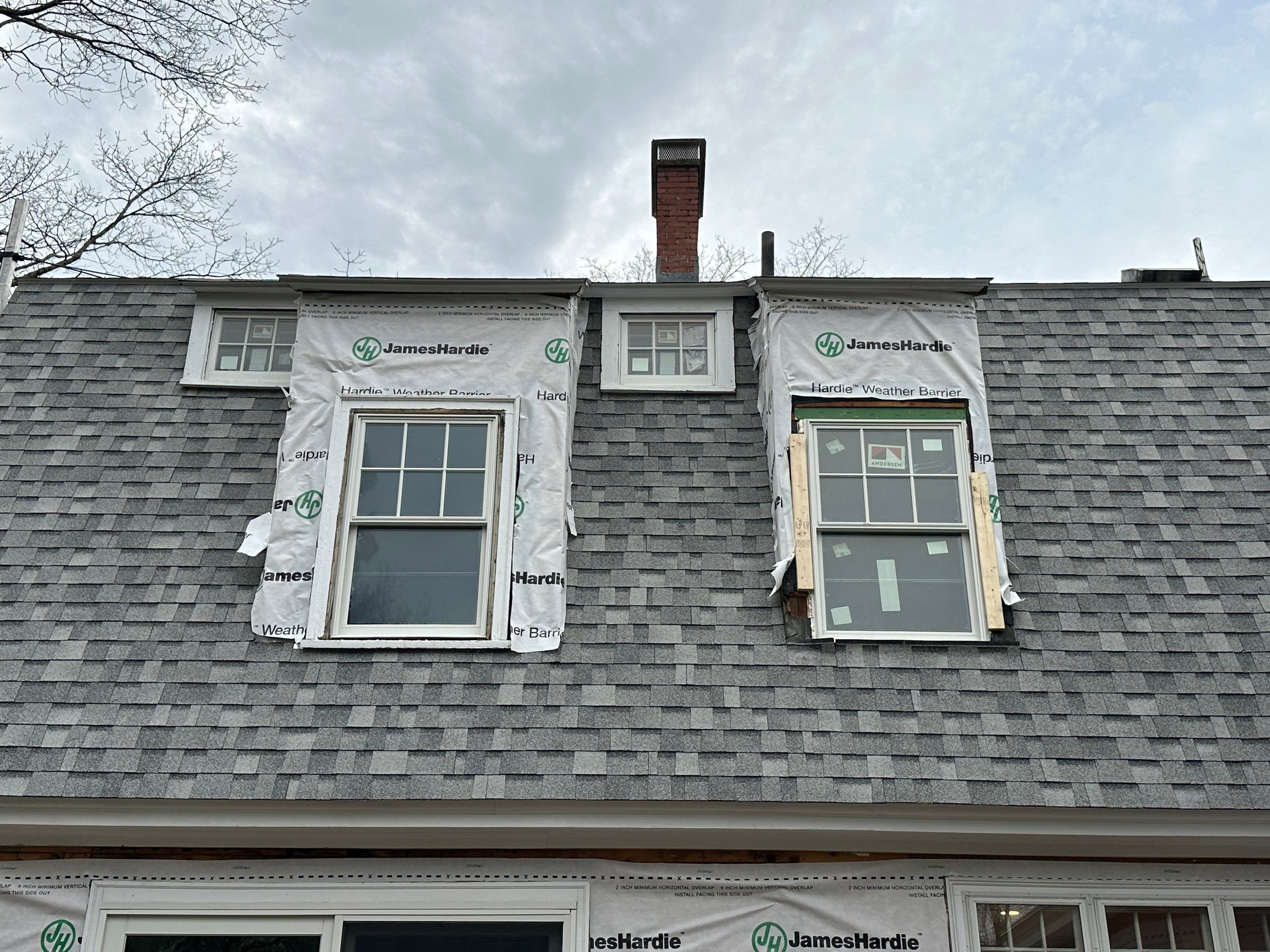 White cedar shingles and windows in Wayland, MA by UBrothers Construction