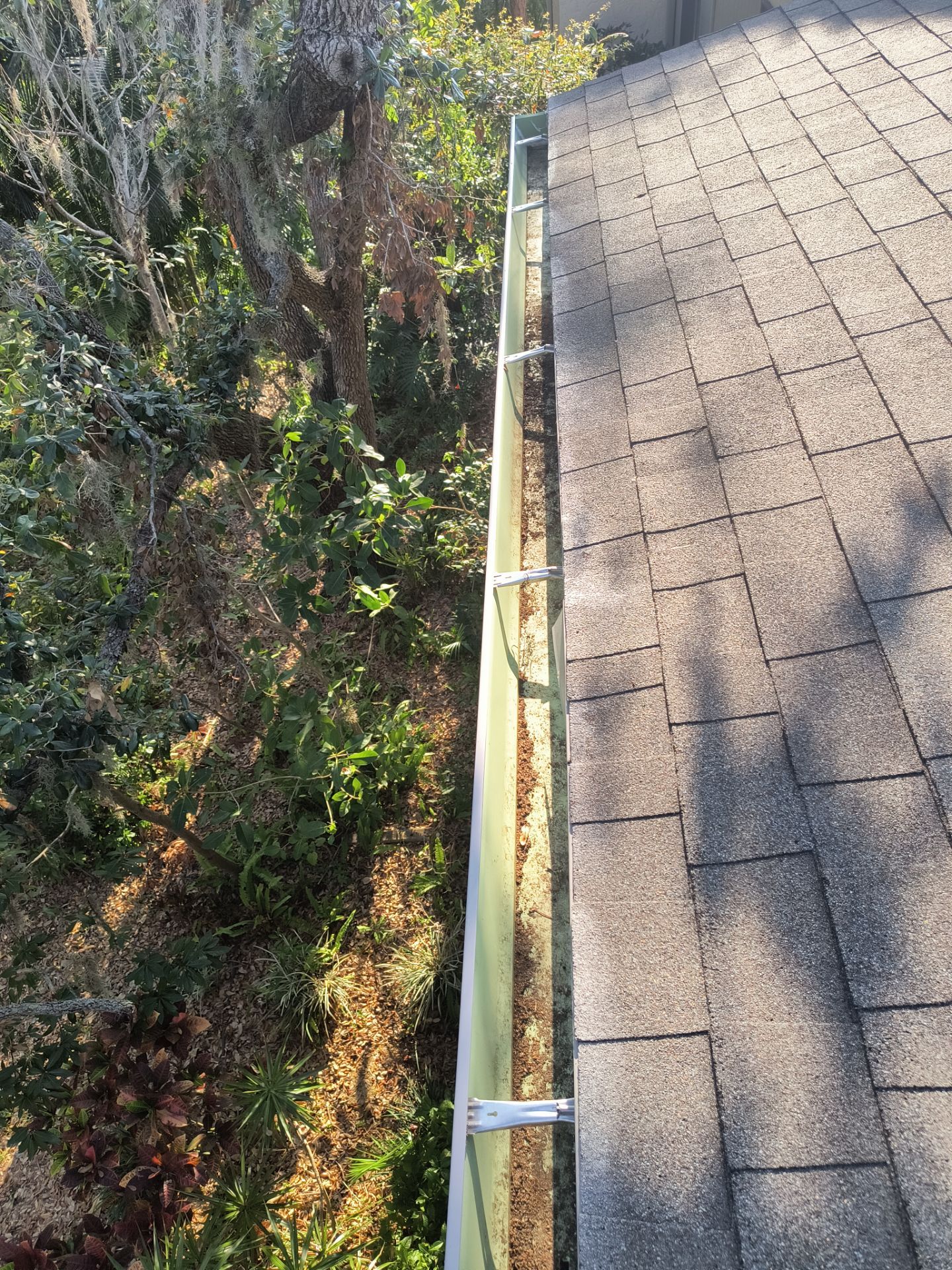 Professional Gutter cleaning Aluminum Seamless Gutters  in Sarasota FL by Gutter Professors