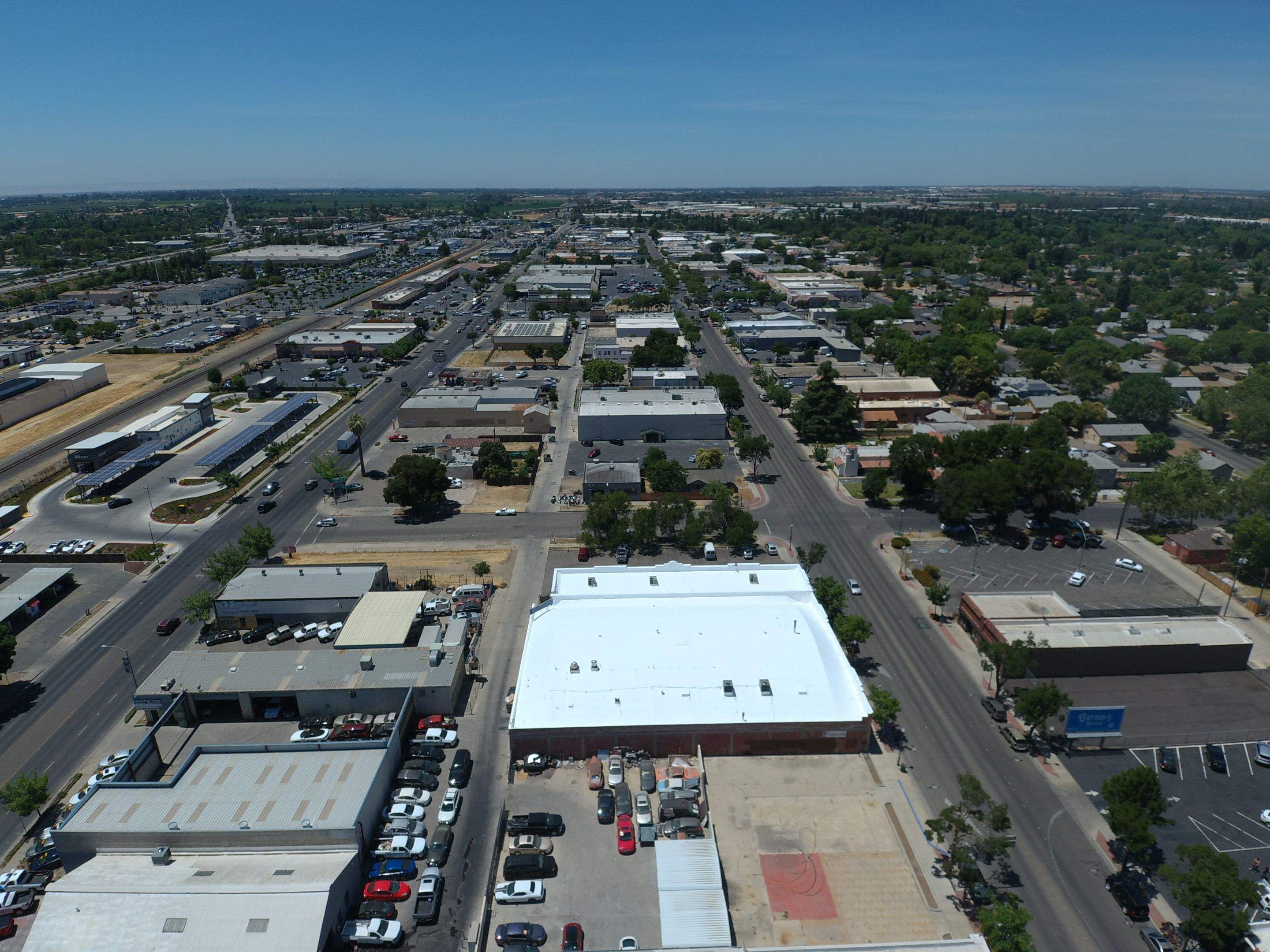 Spray foam and coatings using Conklin Benchmark/PUMA XL coatings and spray foam by Straight Edge Roofing Inc