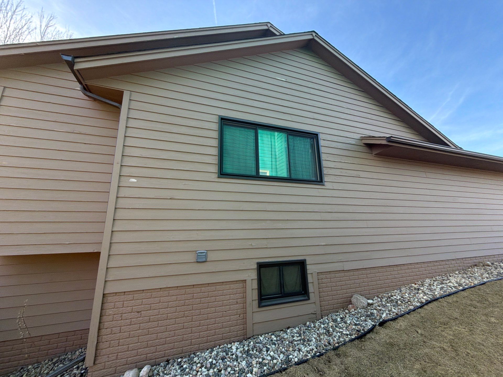 Wood Siding Restoration and Exterior Painting in Sioux Falls by Select Painting, Coatings & Garage Cabinets