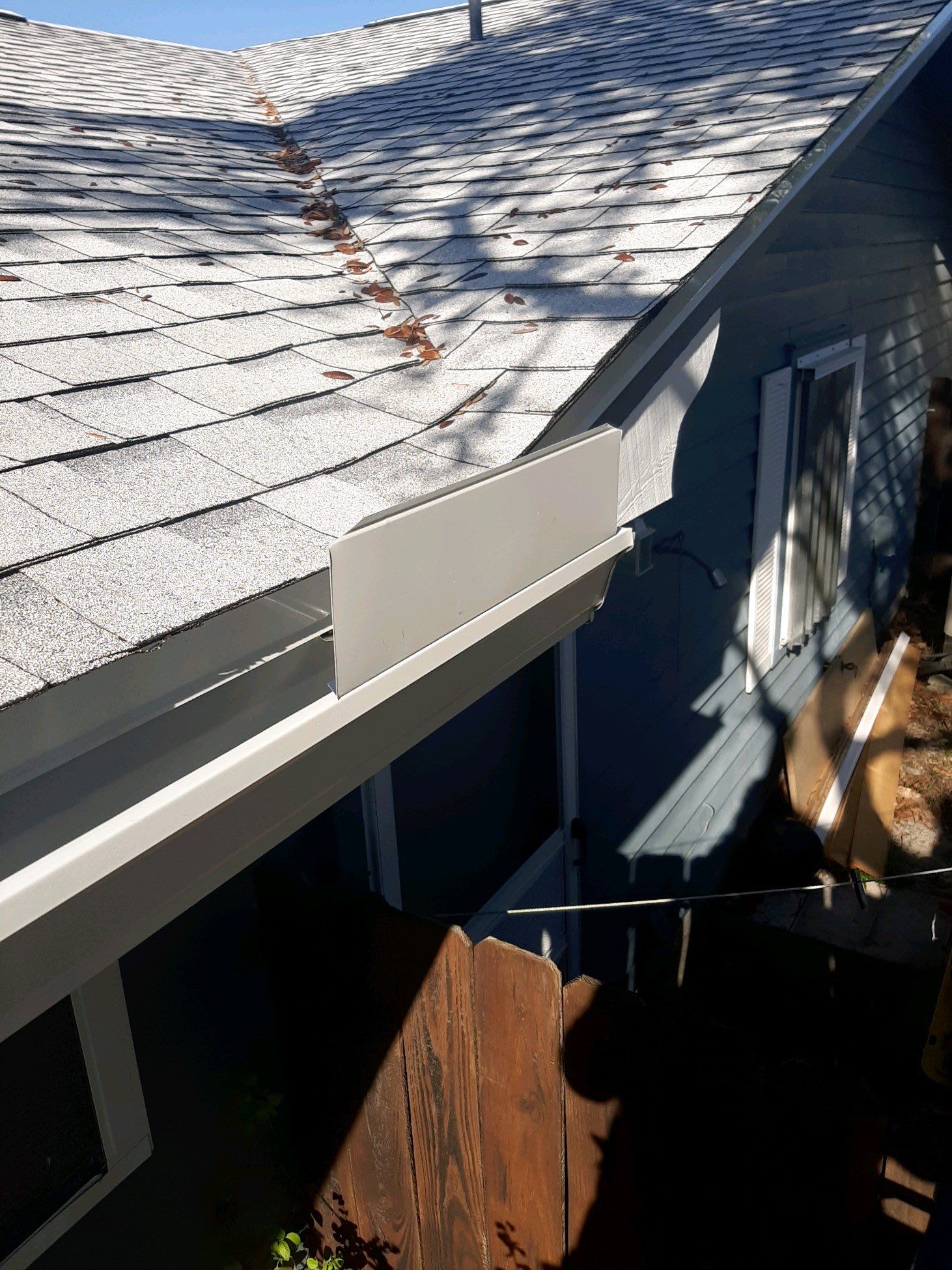 Seamless Gutter Installation Using White K-Style Gutters  by Gutter Professors
