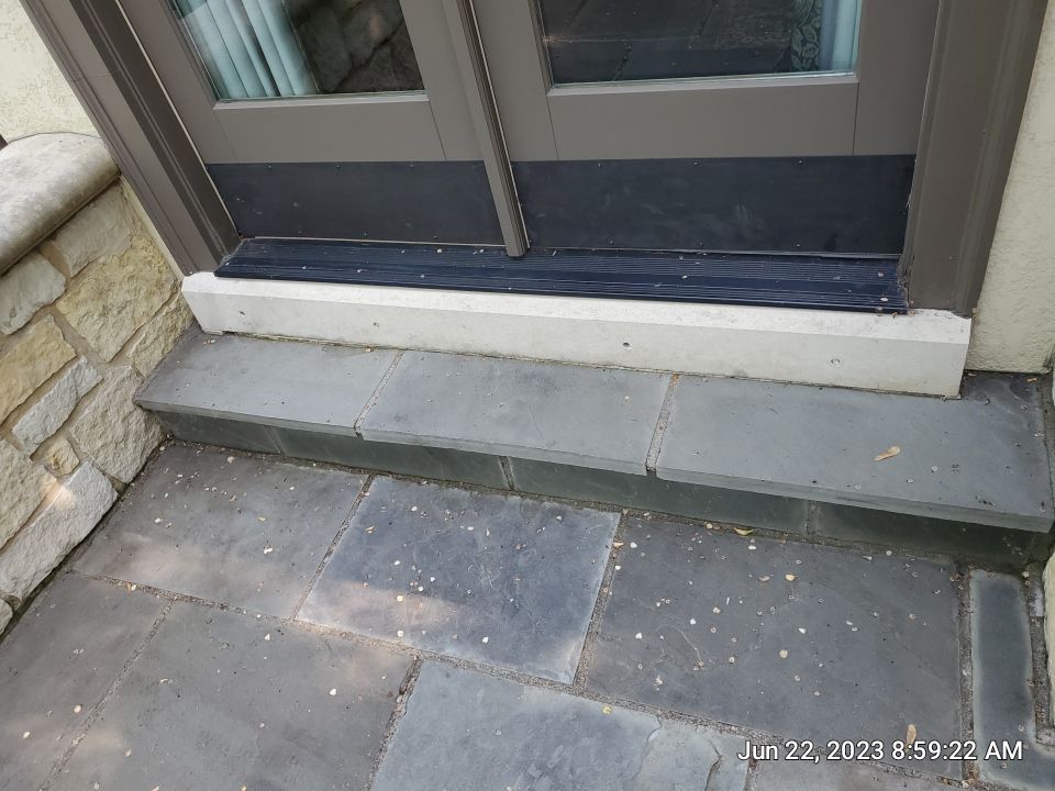 Northbrook, IL stucco home soft wash and stone cleaning by Northern Power Washing LLC.