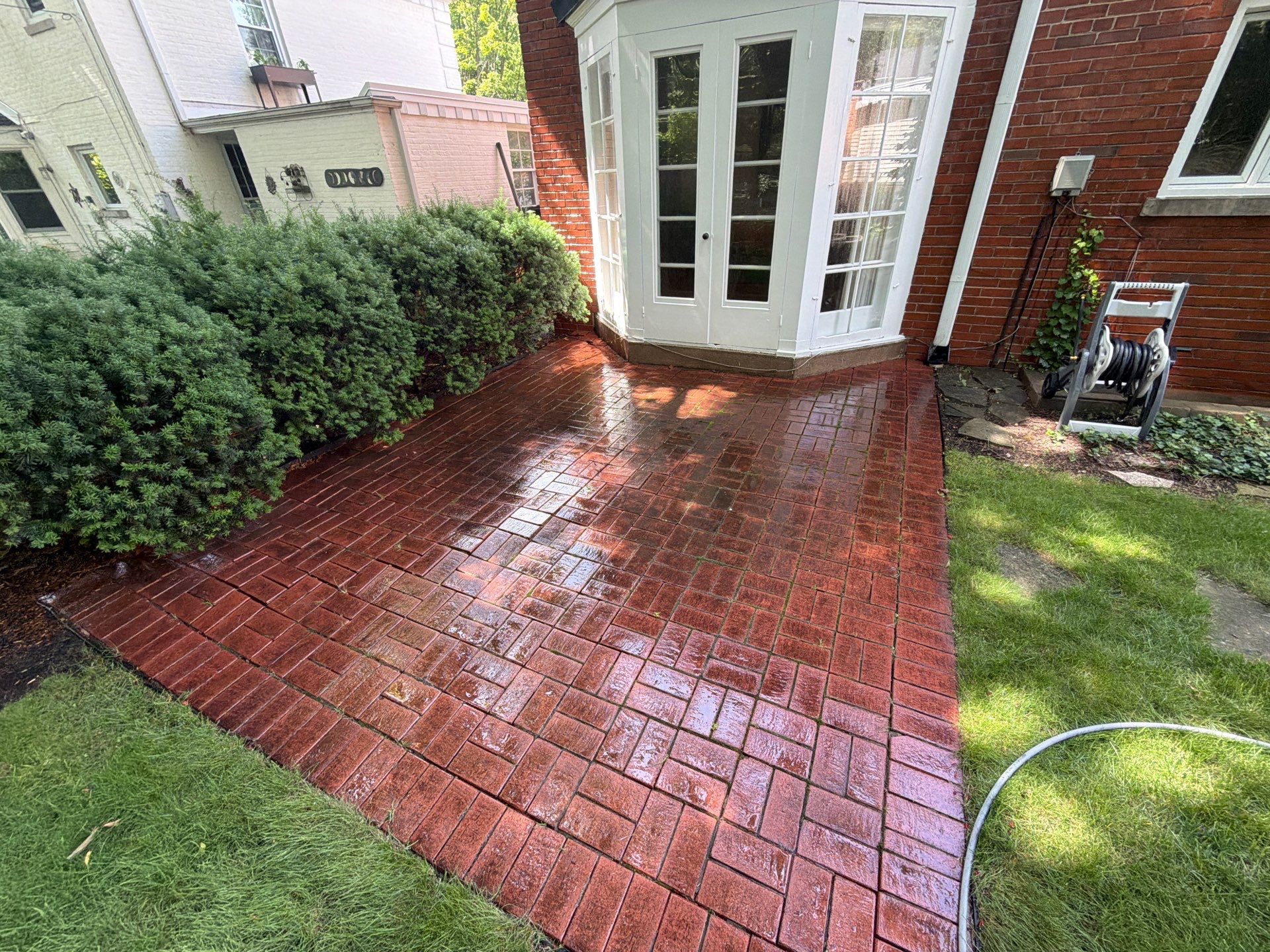 Brick Paver cleaning, sanding, seal by Northern Power Washing LLC.