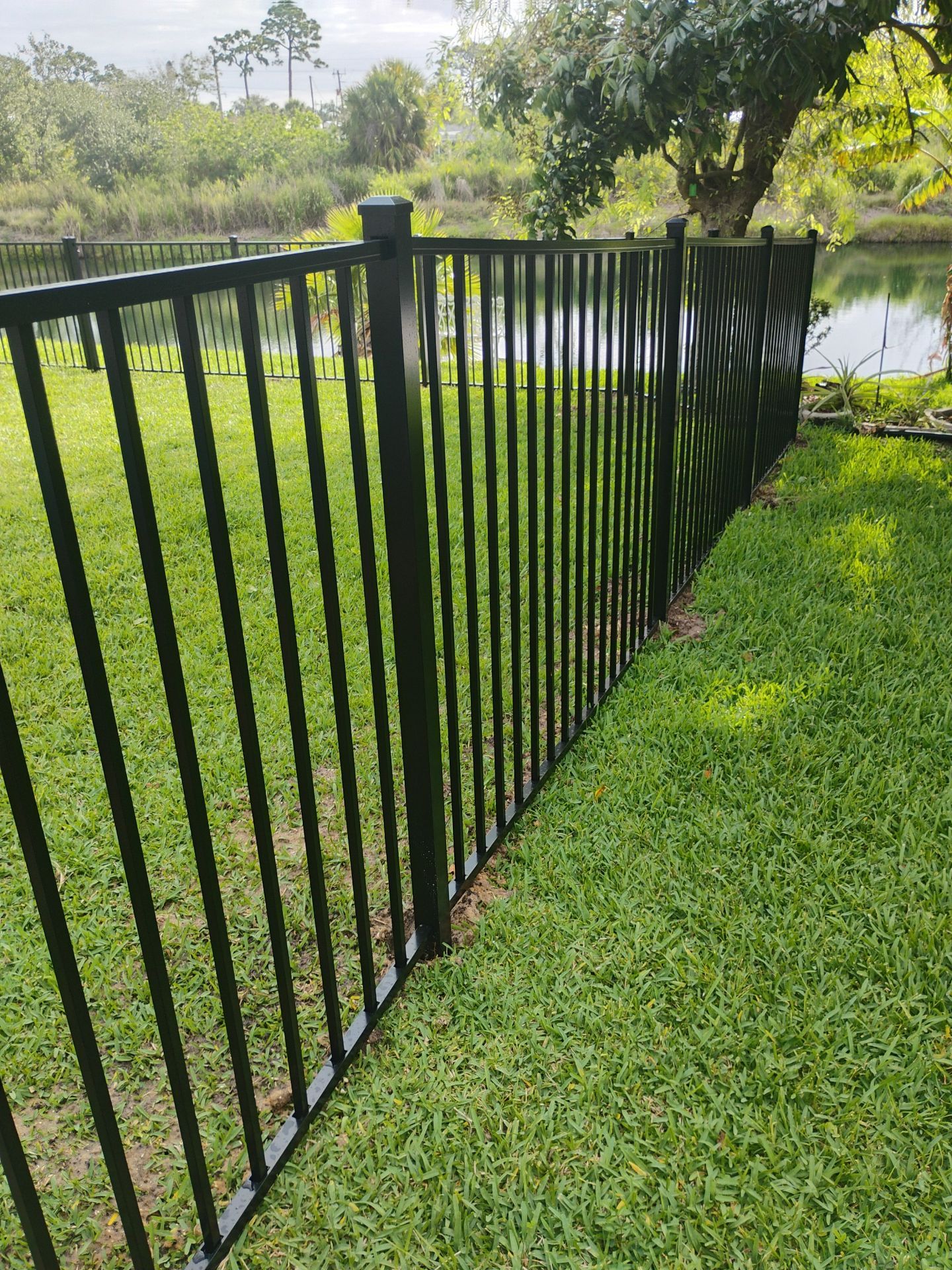 Black Aluminum Picket Fence Installation for Nokomis Waterfront Property by True Fence LLC