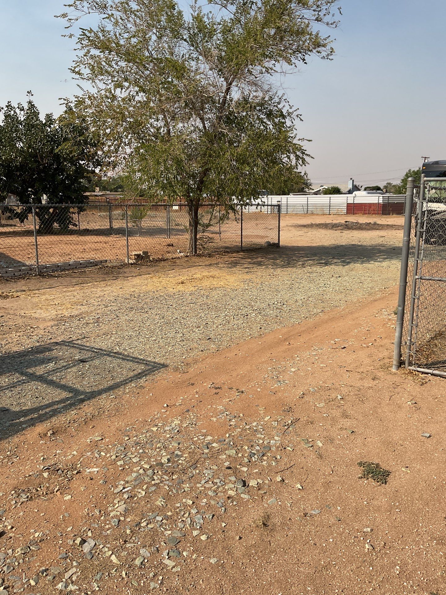 Gate installation using chain -link by Fence Guys Inc.