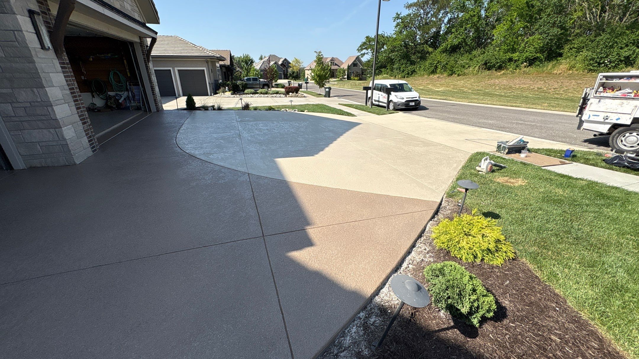 Two-Tone Driveway Resurface - Olathe, KS by Big Red Decorative Concrete, LLC