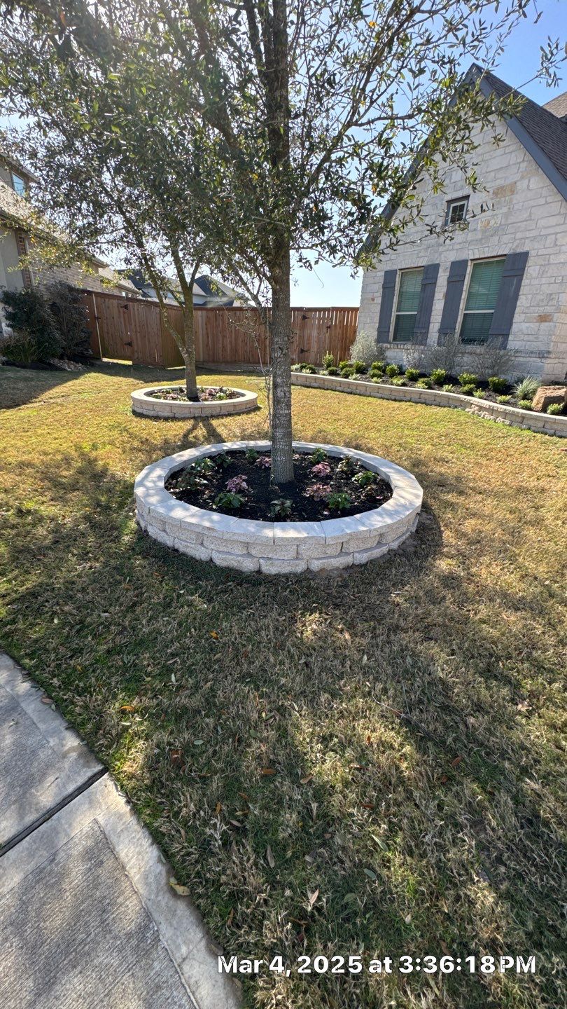 🌿✨ Darlene & Andrew’s Amazing Curb Appeal Transformation  Some projects are more than just landscaping—they’re a conversion of curb appeal from the ground up. For Darlene & Andrew, Alejandro and the Texas Urban Team designed and delivered a complete solution that reshaped their flower beds, solved drainage challenges, and gave new life to the sideyard.  💡 From planning to execution, every step was tailored to build both beauty and functionality:  🌸 Flower Beds, Reinvented  Demolition of old beds, plants, and mulch.  Fresh soil preparation, weed protection, and a brand-new retainer wall built with hand-cut stone and decorative caps.  Carefully selected plants and garden mix to ensure health and visual harmony.  💧 Drainage & Irrigation Upgrades  Outdated corrugated pipes replaced with PVC drainage lines to carry water safely away from the foundation.  New irrigation system combining drip lines and sprinklers—watering plants while keeping the house walls protected.  Sideyard drainage extended with catch basins and PVC piping to prevent water pooling and foundation stress.  🚶 Functional Sideyard with Walkway & Trash Area  Graded and leveled sideyard to manage runoff.  Installed a modern gravel and paver walkway for easy access.  Built a firm and tidy concrete-paver pad for trash containers—making the space both practical and polished.  🛠️ Stonework & Craftsmanship  Every stone in the retainer wall was cut, set, and secured by the team of handcrafters, ensuring a durable build that doubles as a design statement.  ✅ Outcome: Darlene & Andrew’s property now has better drainage, a clean and organized sideyard, and elegant new flower beds—all designed for long-term durability and lasting beauty.  📢 Before hiring anyone, review our portfolio. Our work speaks louder than words—each project is a blend of function, protection, and design crafted to last. by Texas Urban Elements