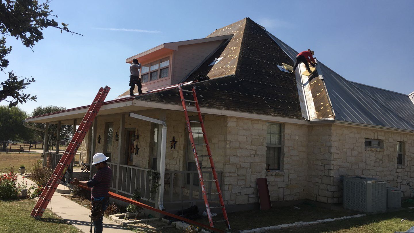 R-Panel Metal Roof Replacement by First Out Roofing 
