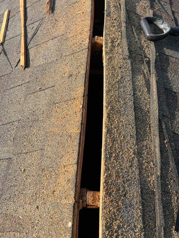 Residential Roofing Repair using Ridge vent replacement by Nitro Roofing and Construction