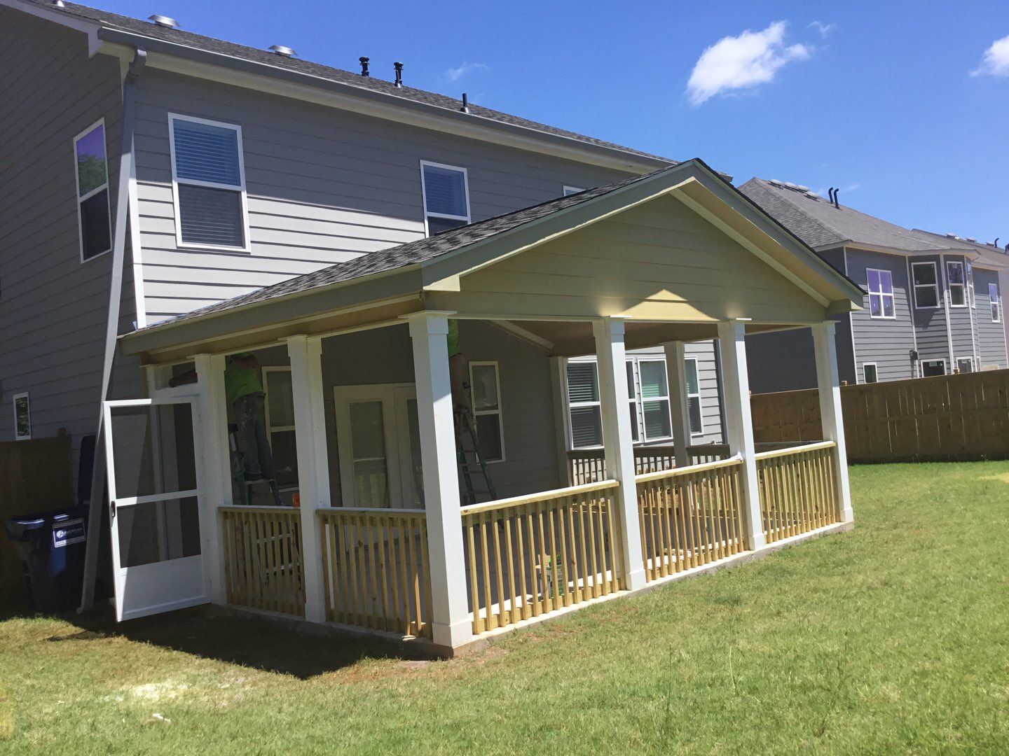Screened Porch Addition With Gabled Roof and Tongue and Groove Ceiling by Swift Home Renovations