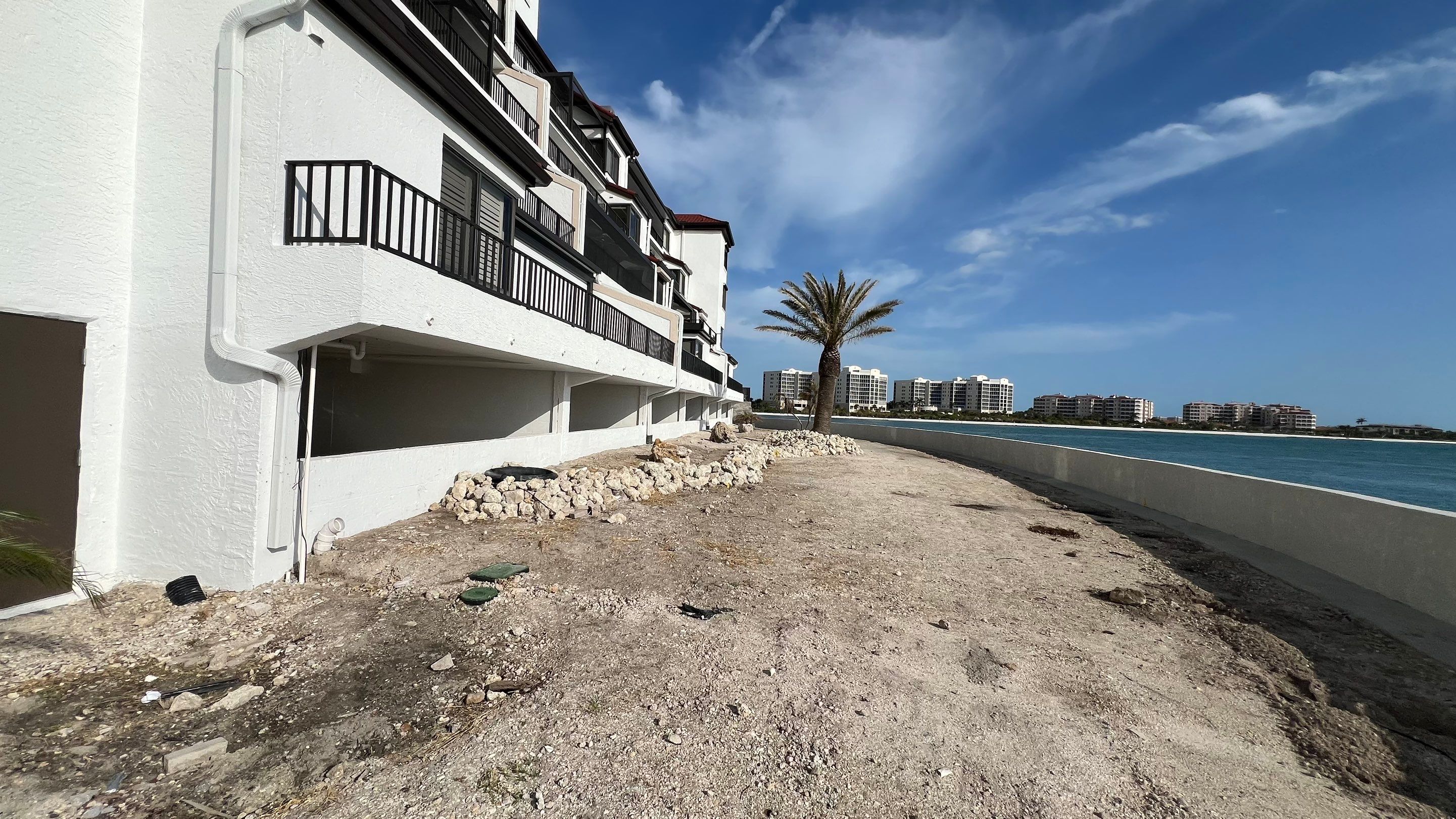 Isles of Capri Condo Parking Garage Drainage System Cleaning by APS Power & Water