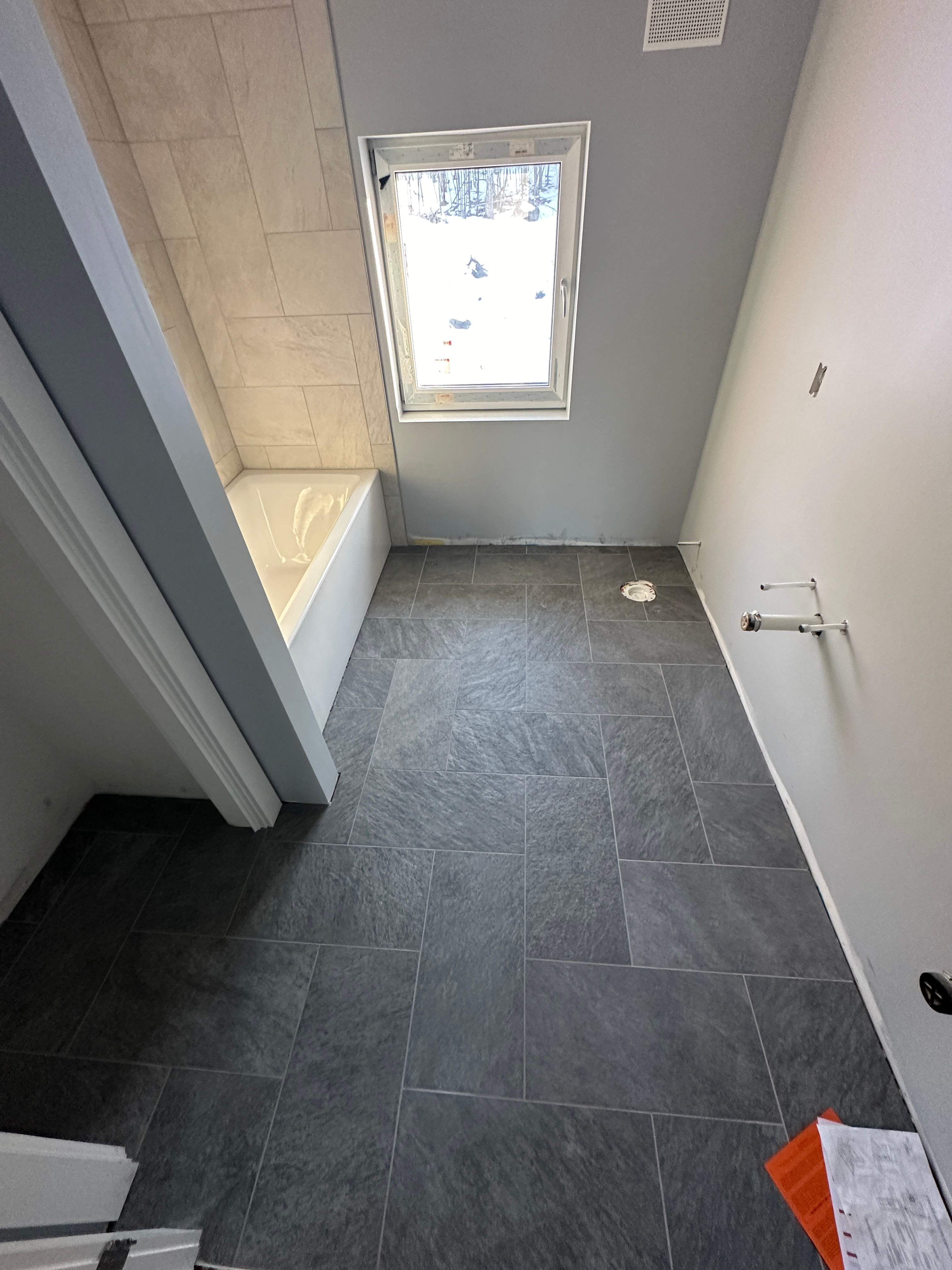 New Construction Tile by Renovatic LLC