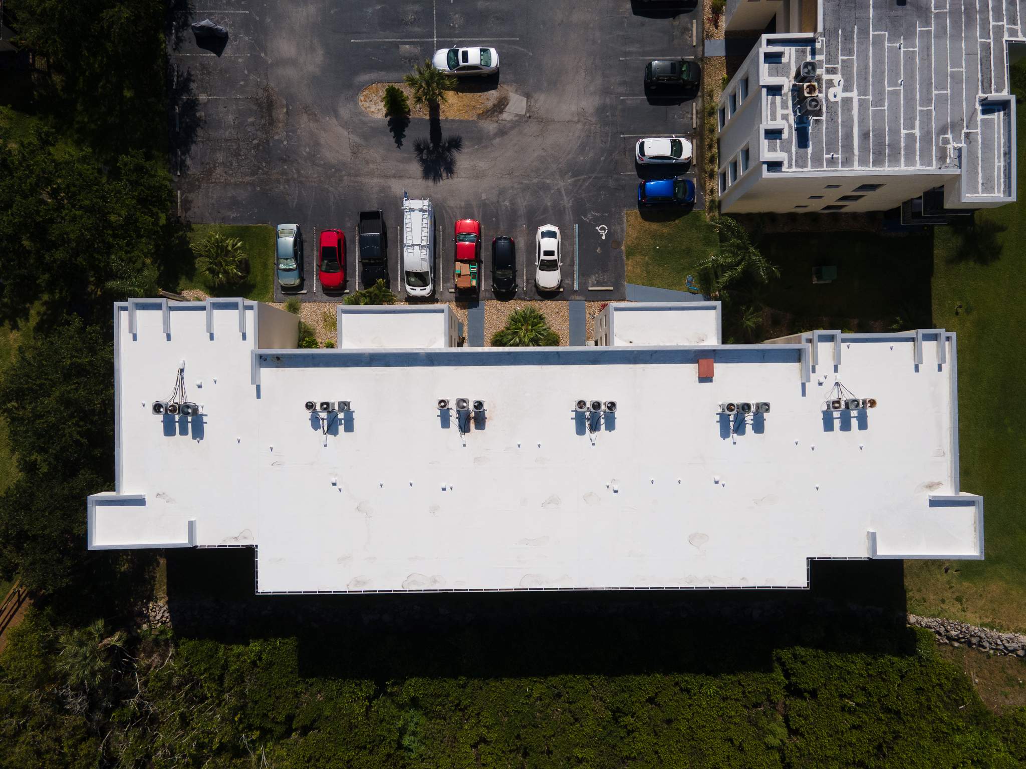 Multi-Building Flat Roof Replacement at Cape Canaveral Condominiums by Wiedmann Construction & Roofing