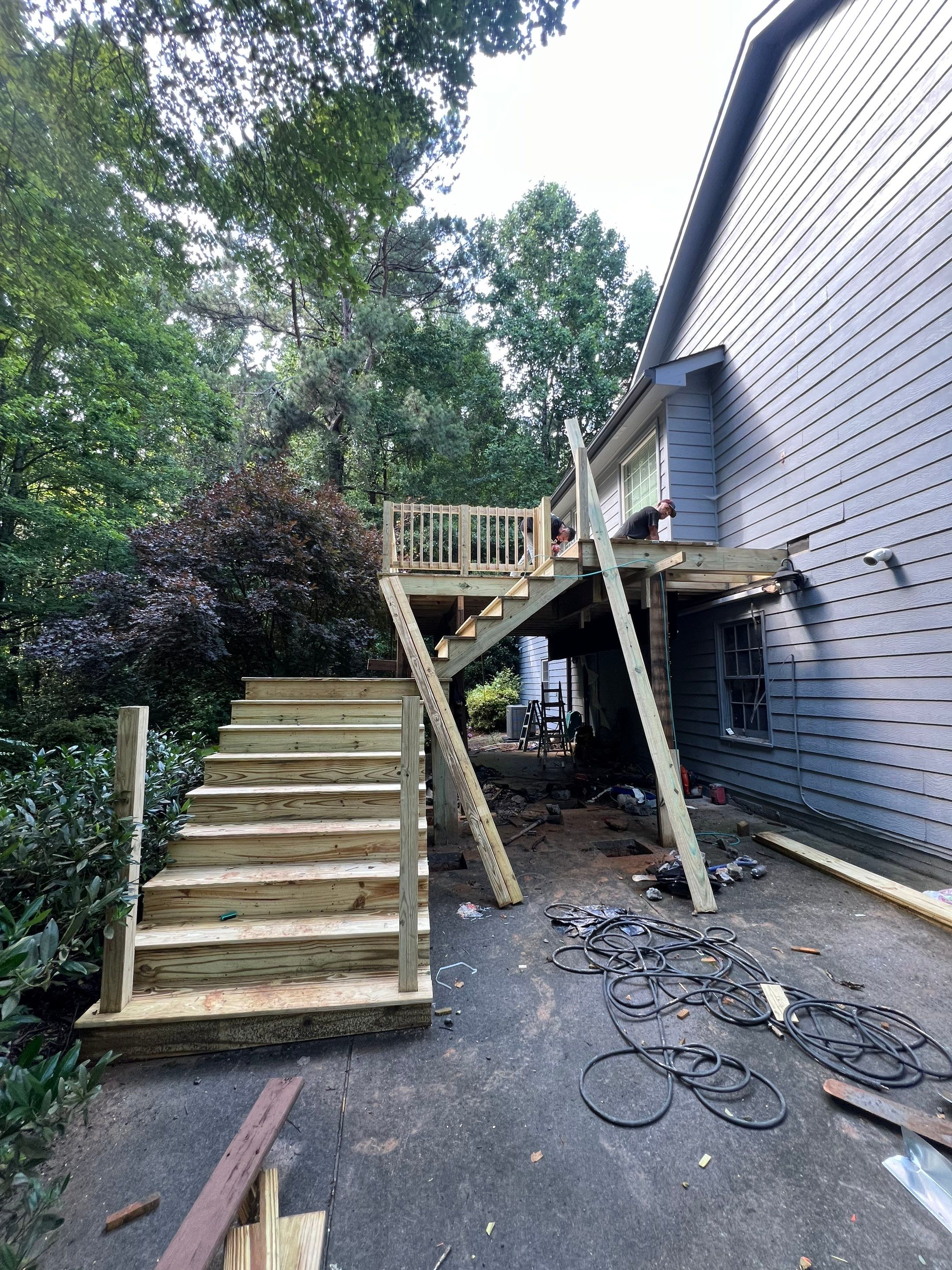 Pressure-Treated Wood Deck Replacement and Staircase Installation in Kennesaw by Swift Home Renovations