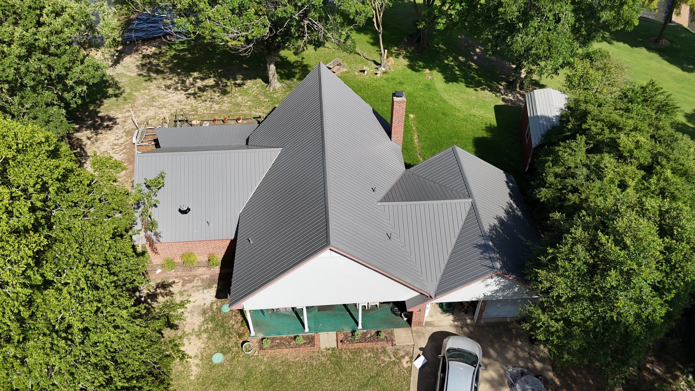 Charcoal Metal Roof at Lake Limestone, Tx by DT Roofing - Seth Wells