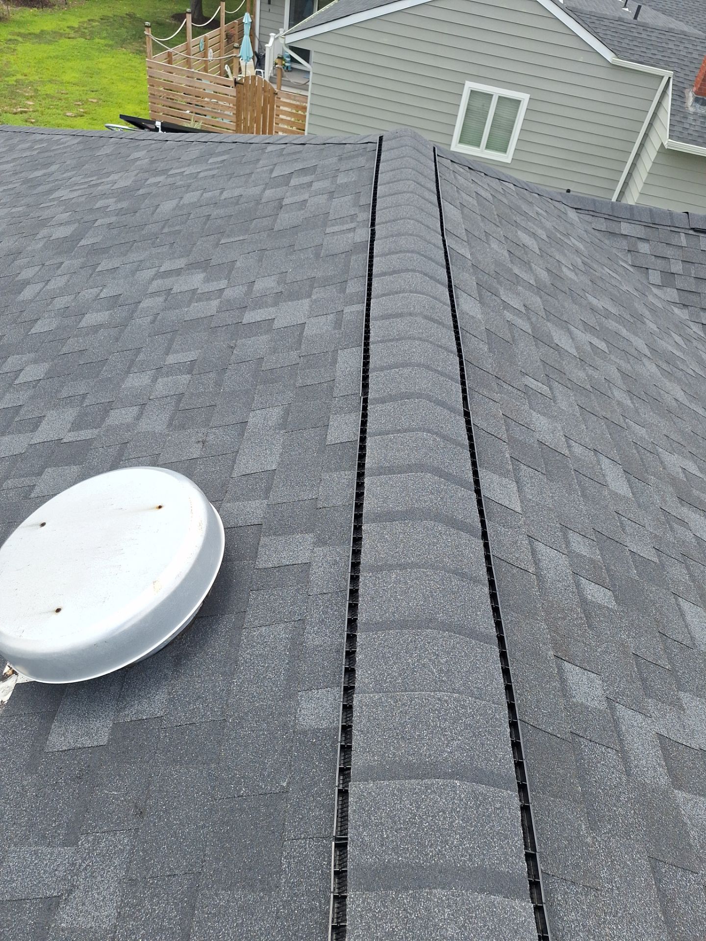 Estate Gray Shingles by Reimagine Roofing
